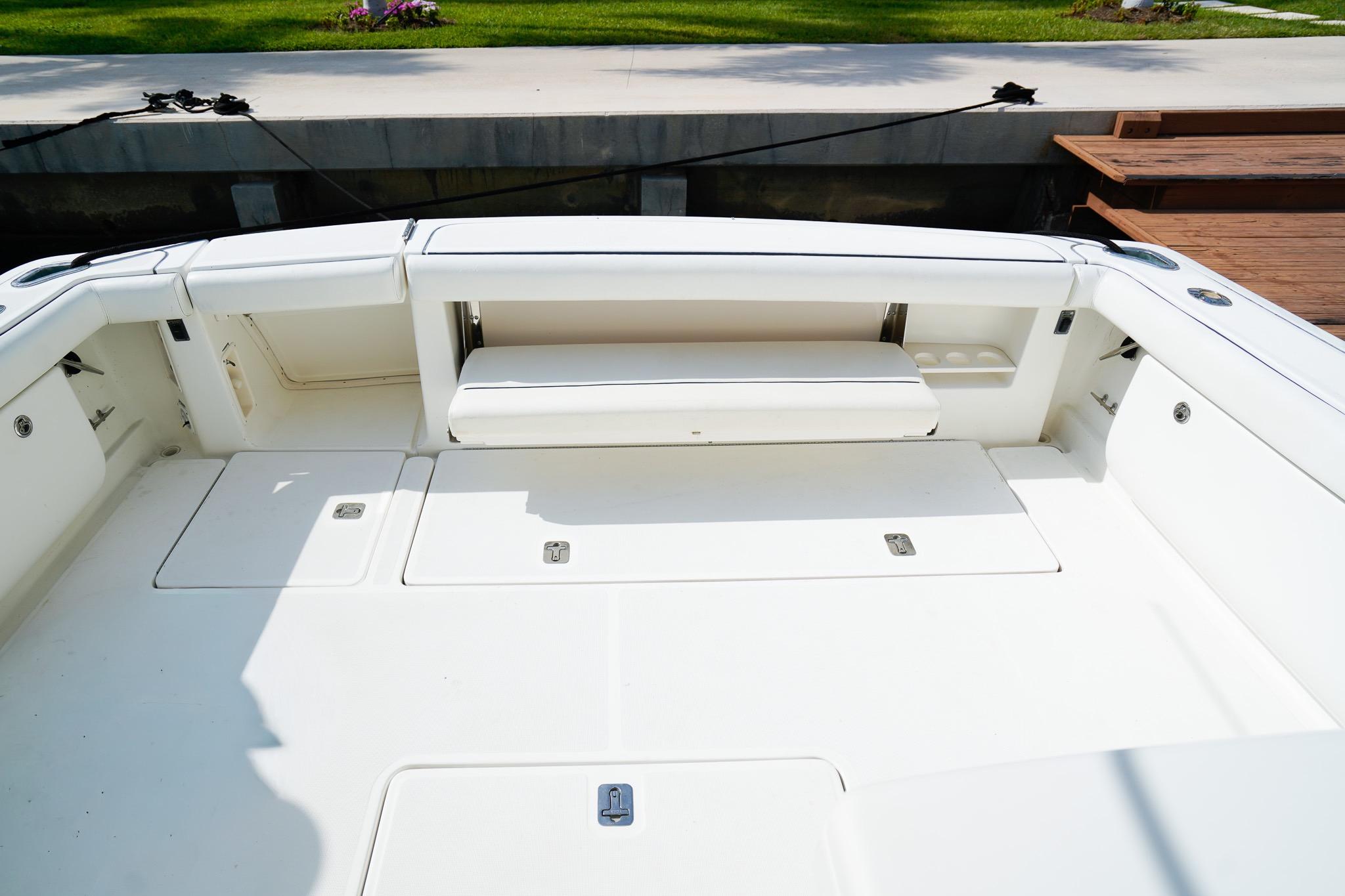 2005 Tiara Yachts 3800 Open boat deck with seating and storage compartments.