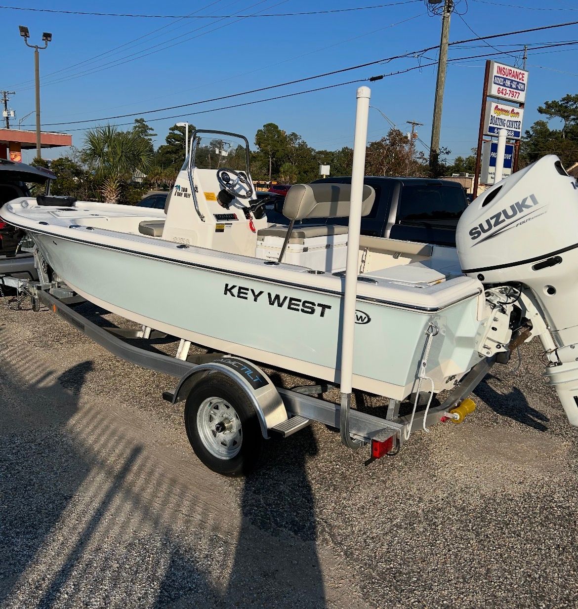 Key West 188 Bay Reef boat 2023 on trailer with Suzuki engine.