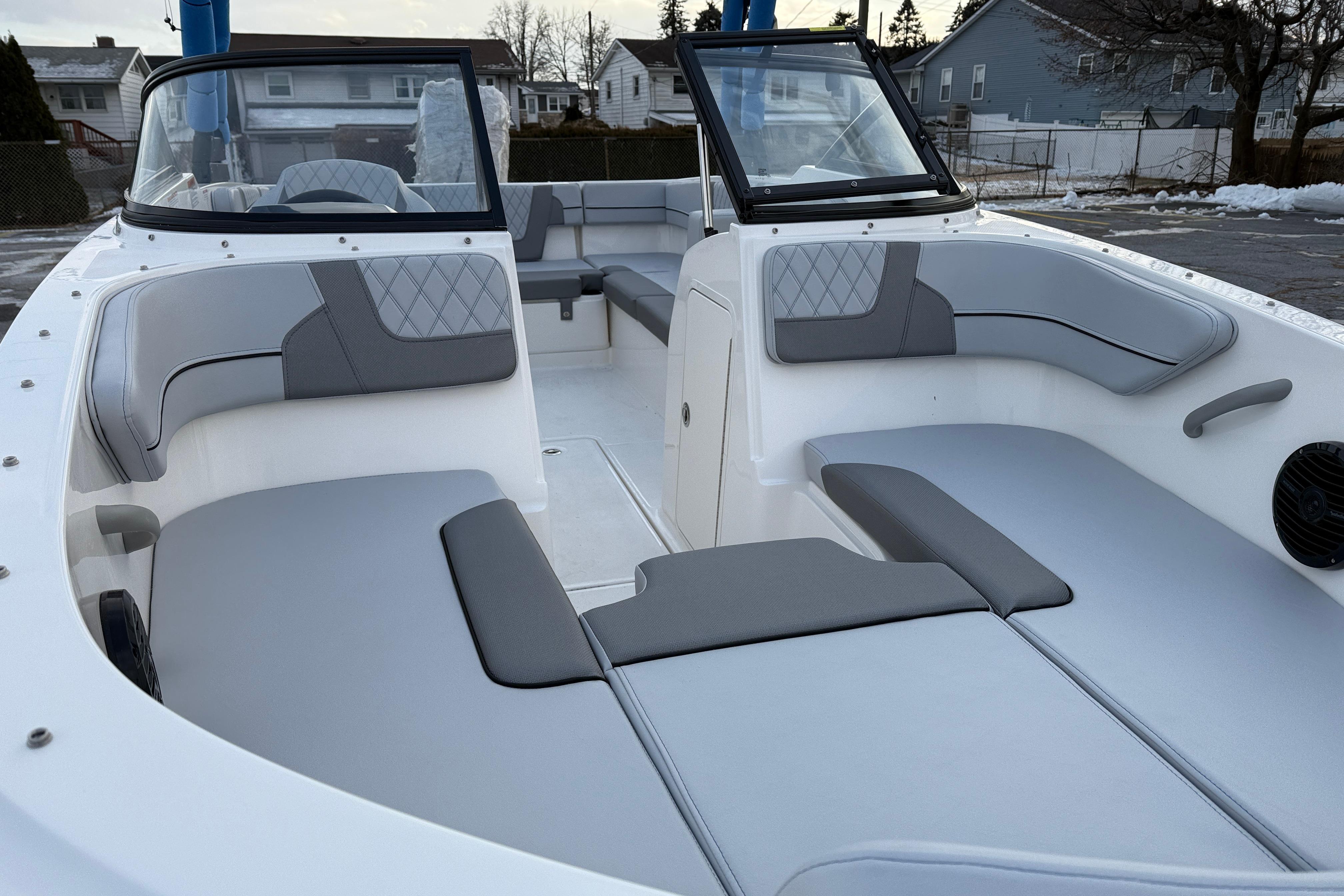 2026 Bayliner VR4 Bowrider OB interior with gray seating and open deck layout.