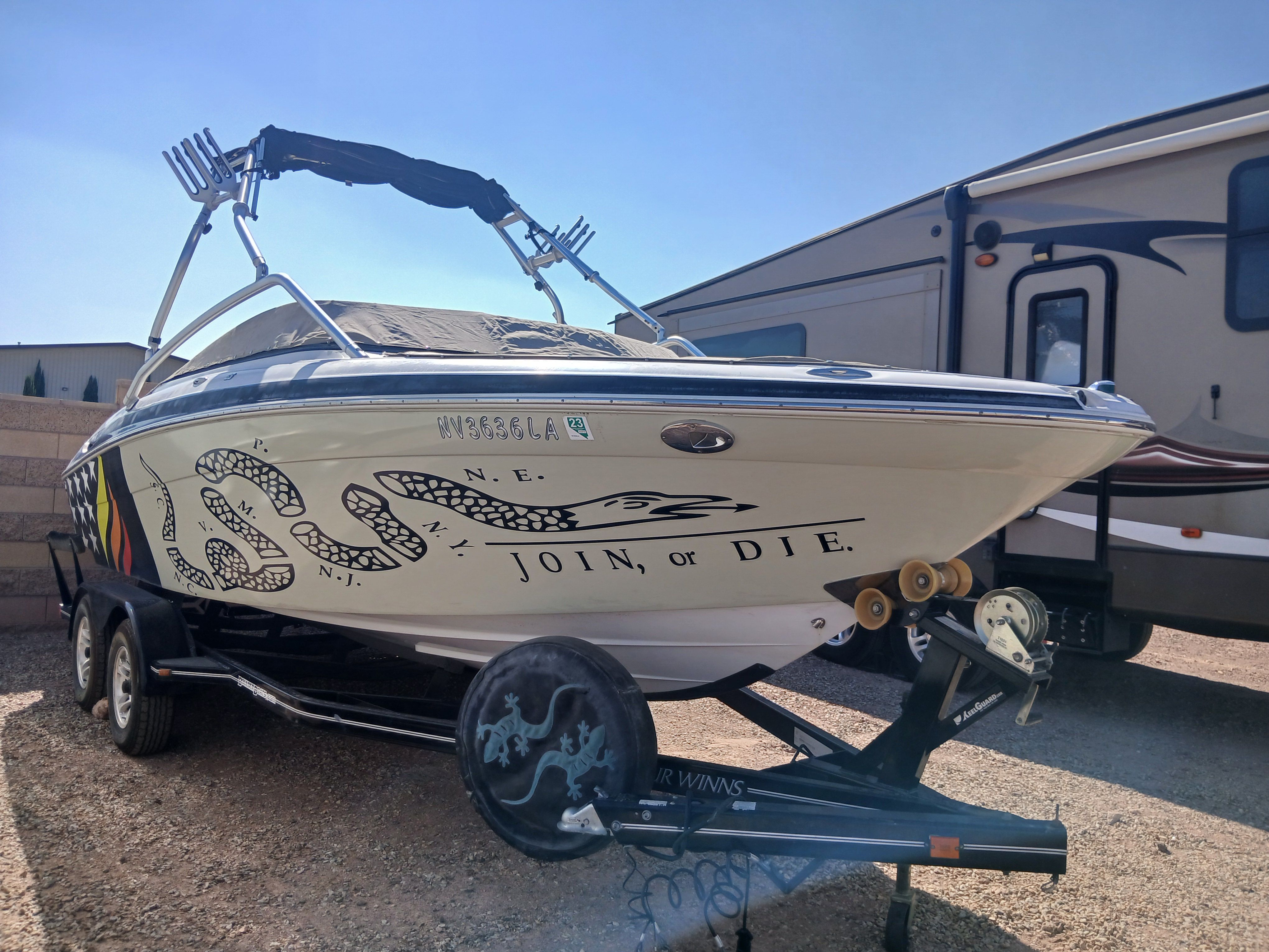 2008 Four Winns H220SS boat with "Join or Die" design.