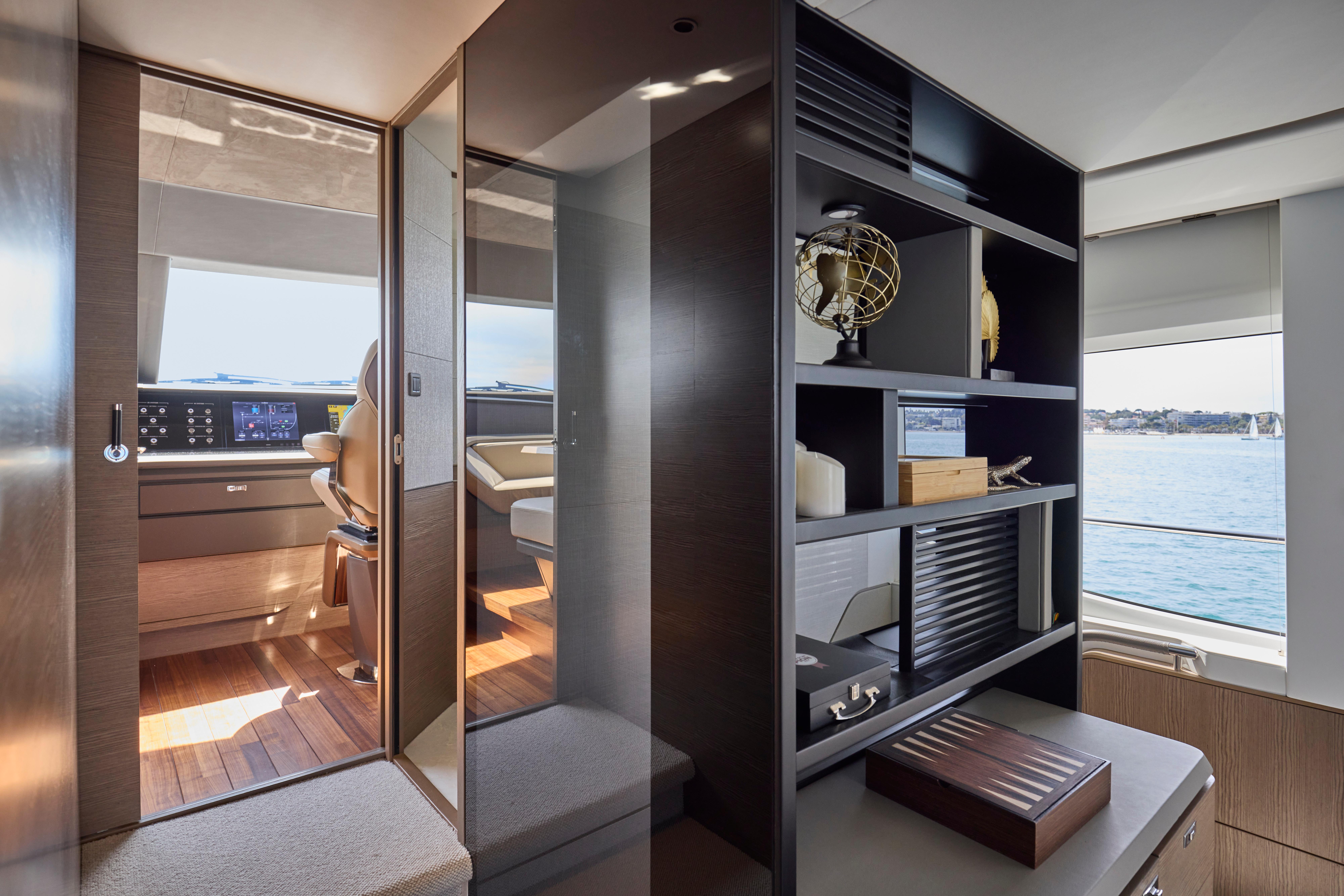 Luxurious interior of 2024 Princess Y85 yacht with modern design and ocean view.
