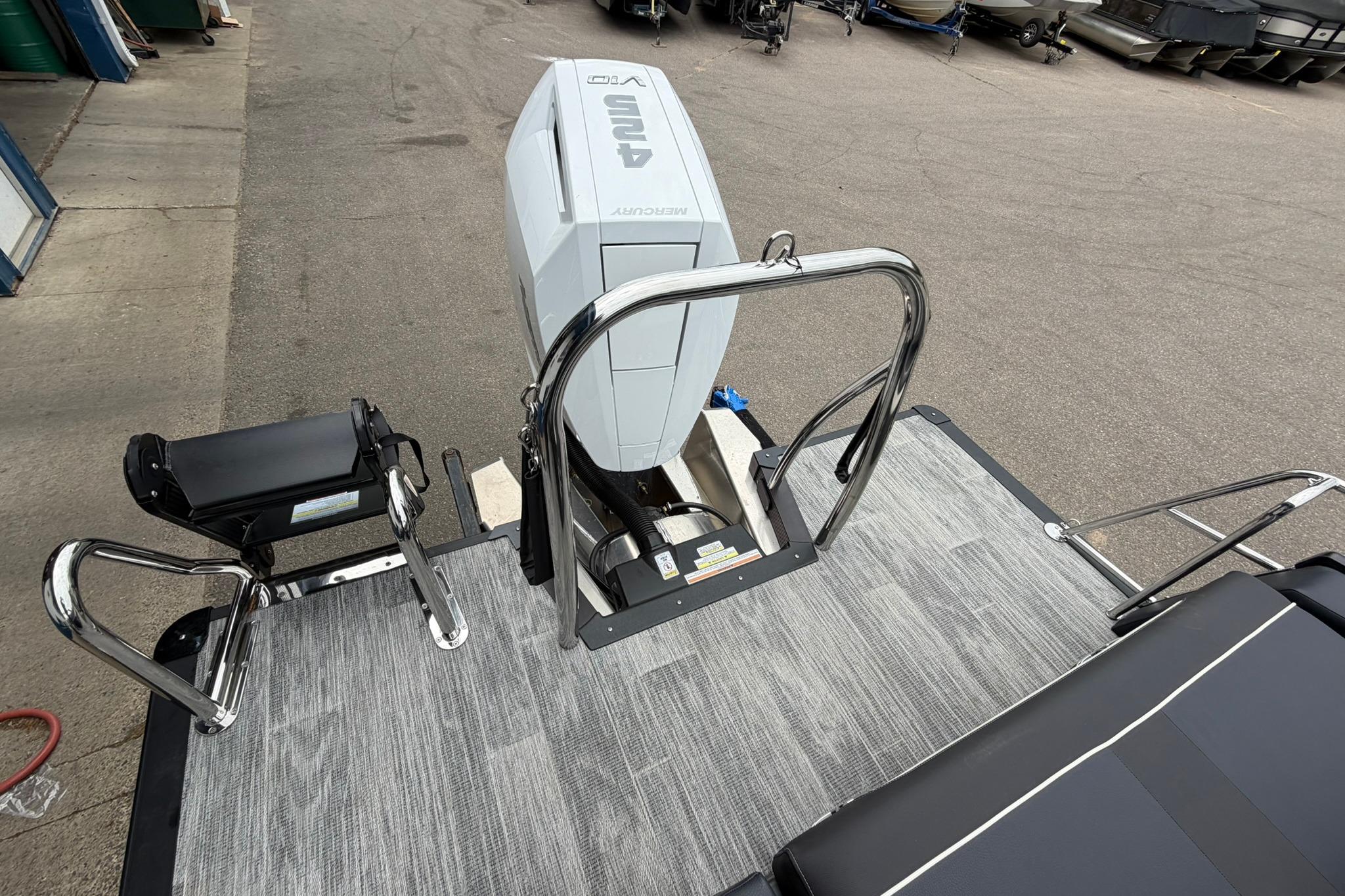 2026 Avalon Excalibur LTD Flex Lounge boat with Yamaha outboard motor, rear deck view.