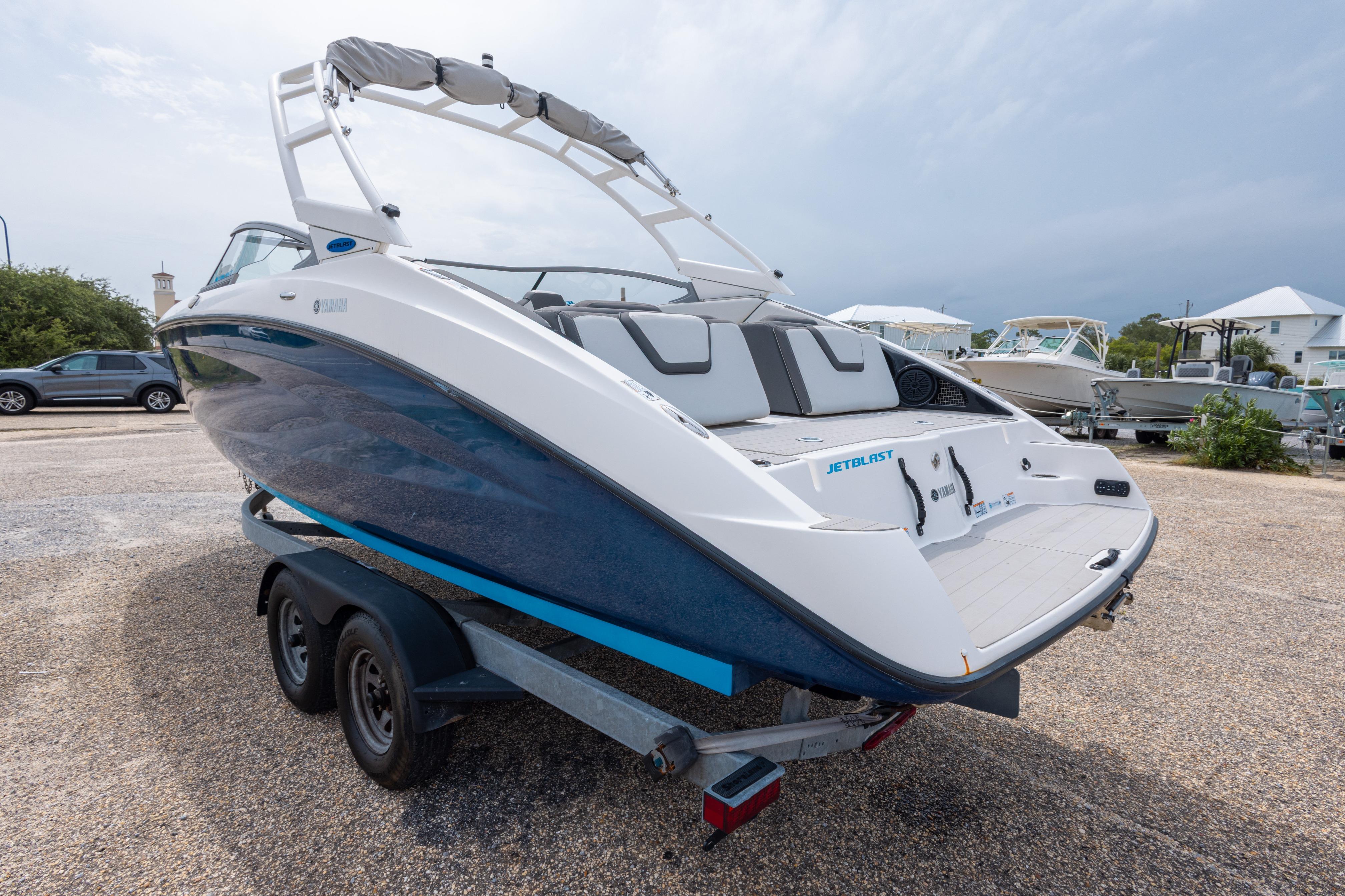 2021 Yamaha Boats AR250 on trailer, showcasing sleek design and modern features.