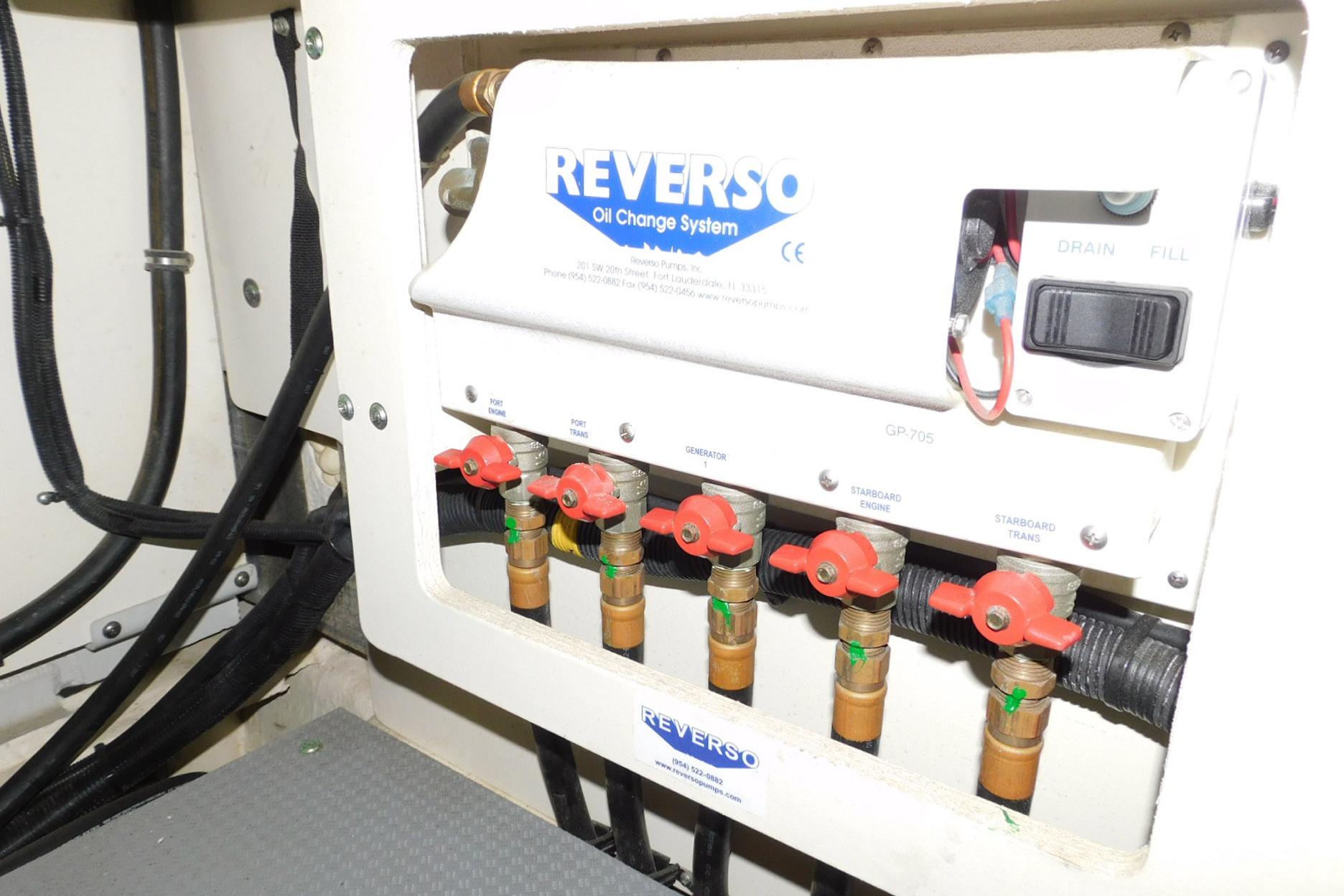 Reverso oil change system in 2019 Sea Ray L550 yacht engine room.