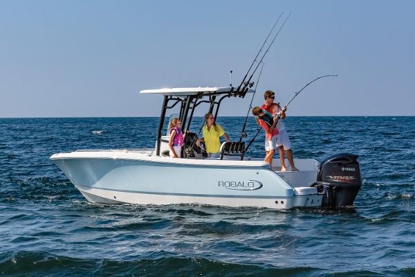 Manufacturer Provided Image: 2020 Robalo R230 Center Console boat with people fishing on the ocean.