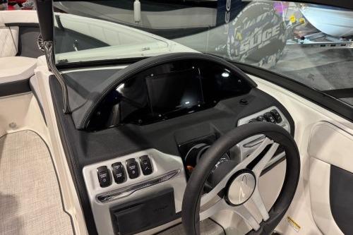 2026 Regal 21 OBX boat dashboard with steering wheel and control panel.