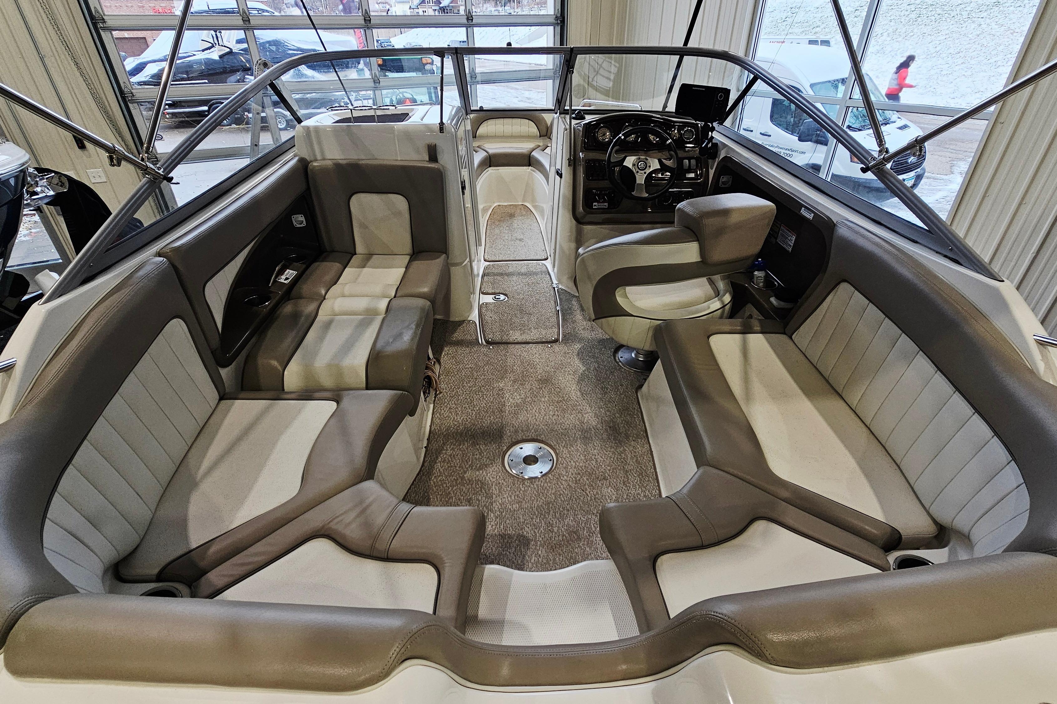 2009 Yamaha Boats 232 Limited interior with spacious seating and modern dashboard.