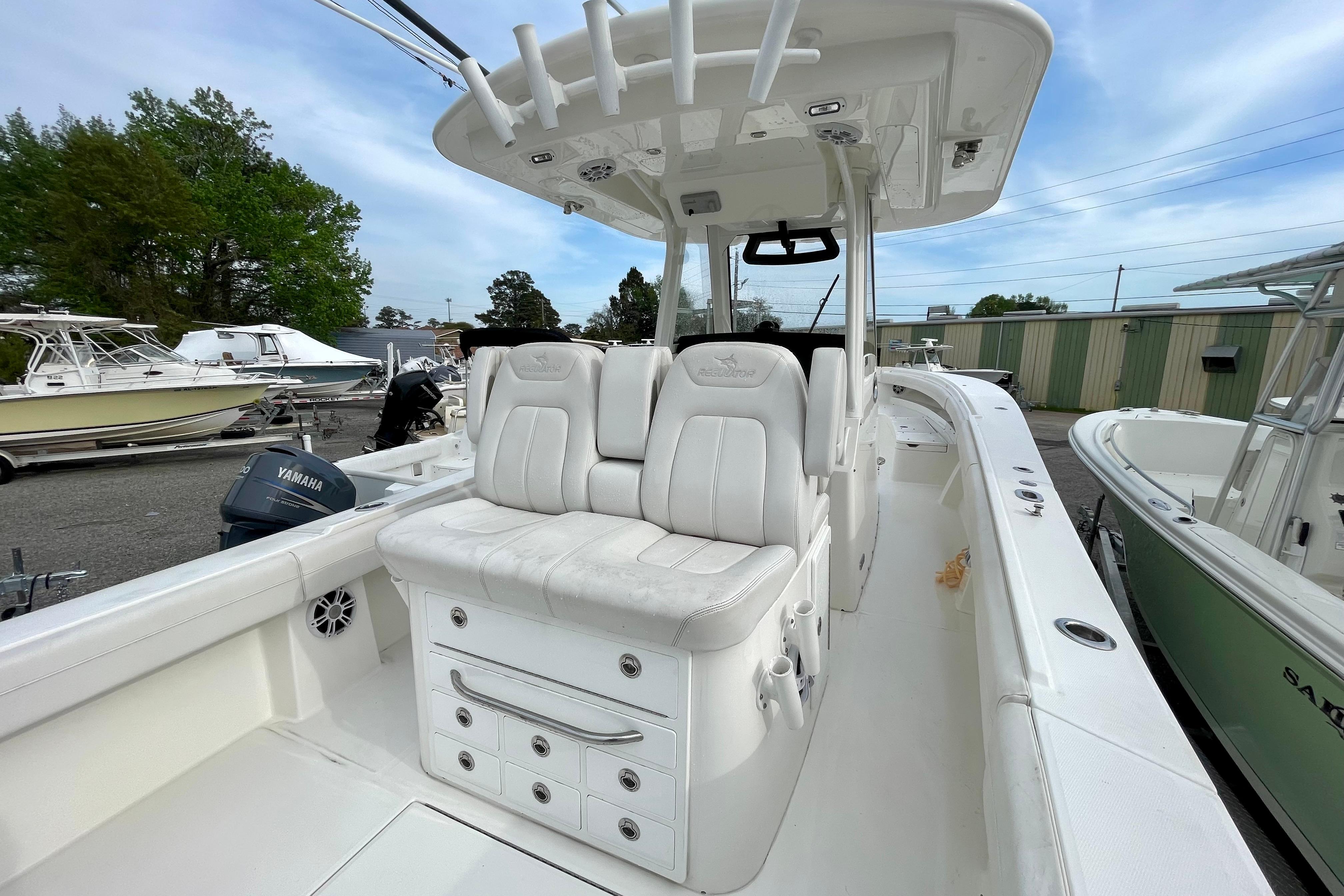 2023 Regulator 34 boat interior with white seating and storage compartments.