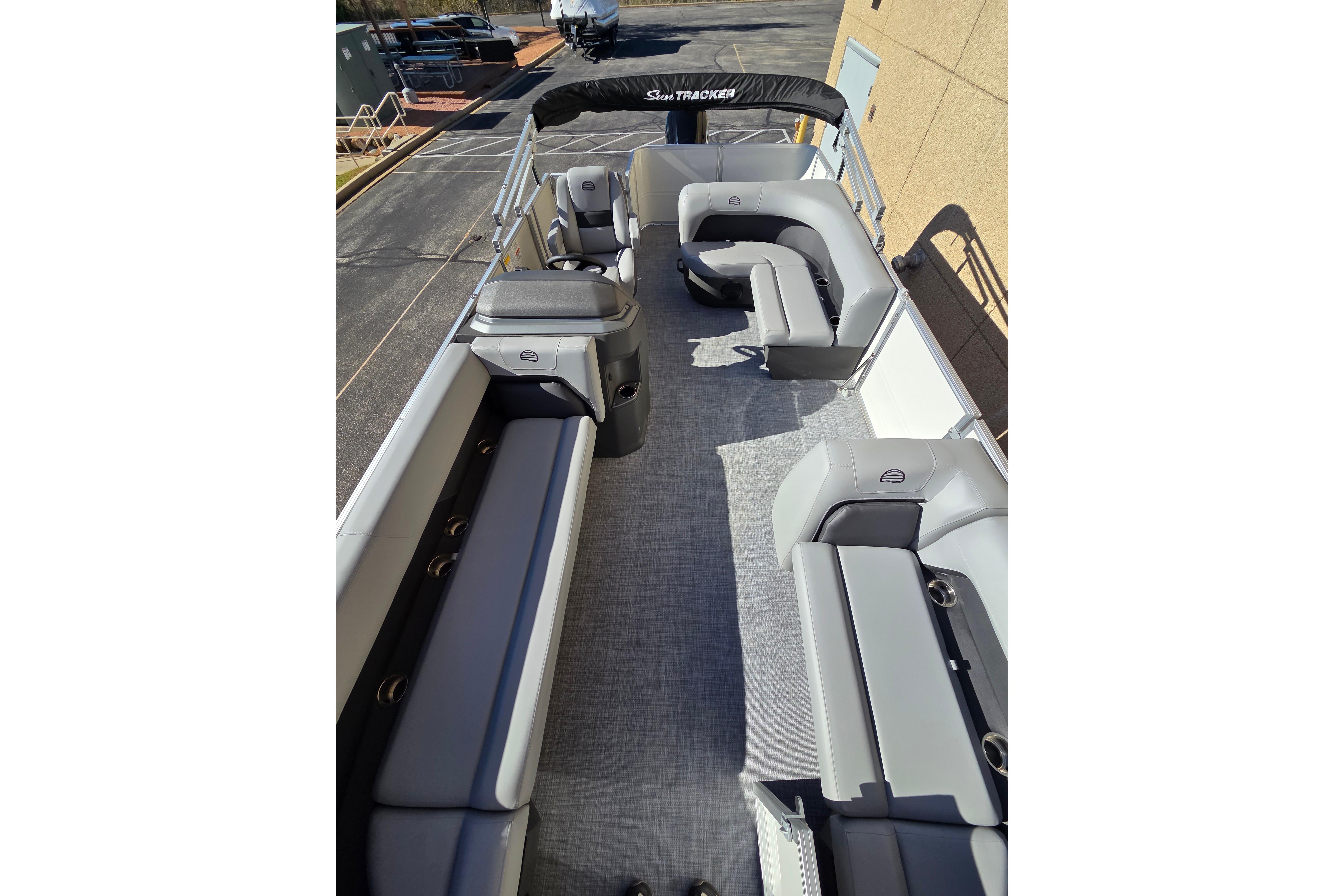 2026 Sun Tracker Party Barge 18 DLX interior with spacious seating and modern design.