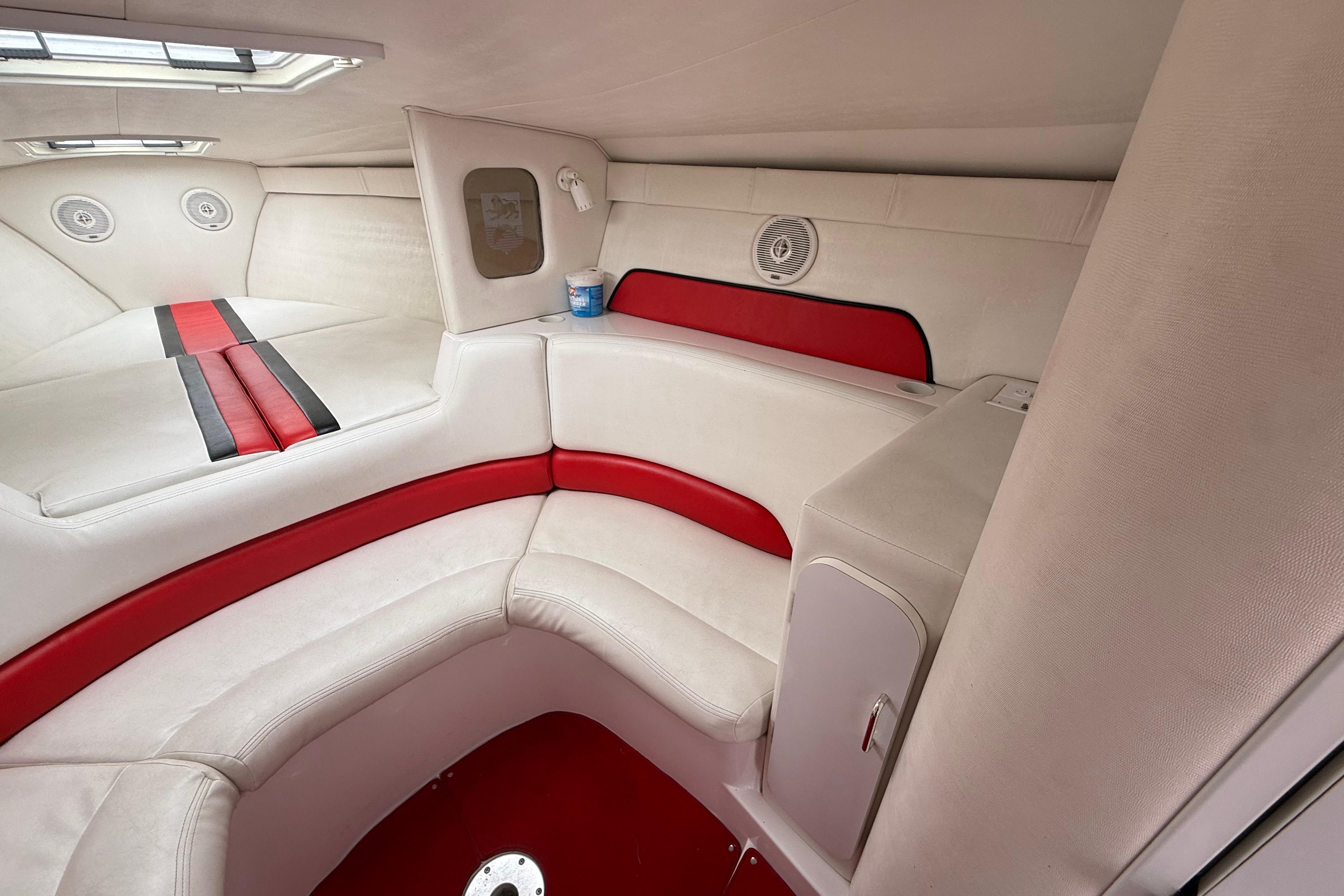 Interior of a 1998 Donzi 33 ZX boat with red and white seating.