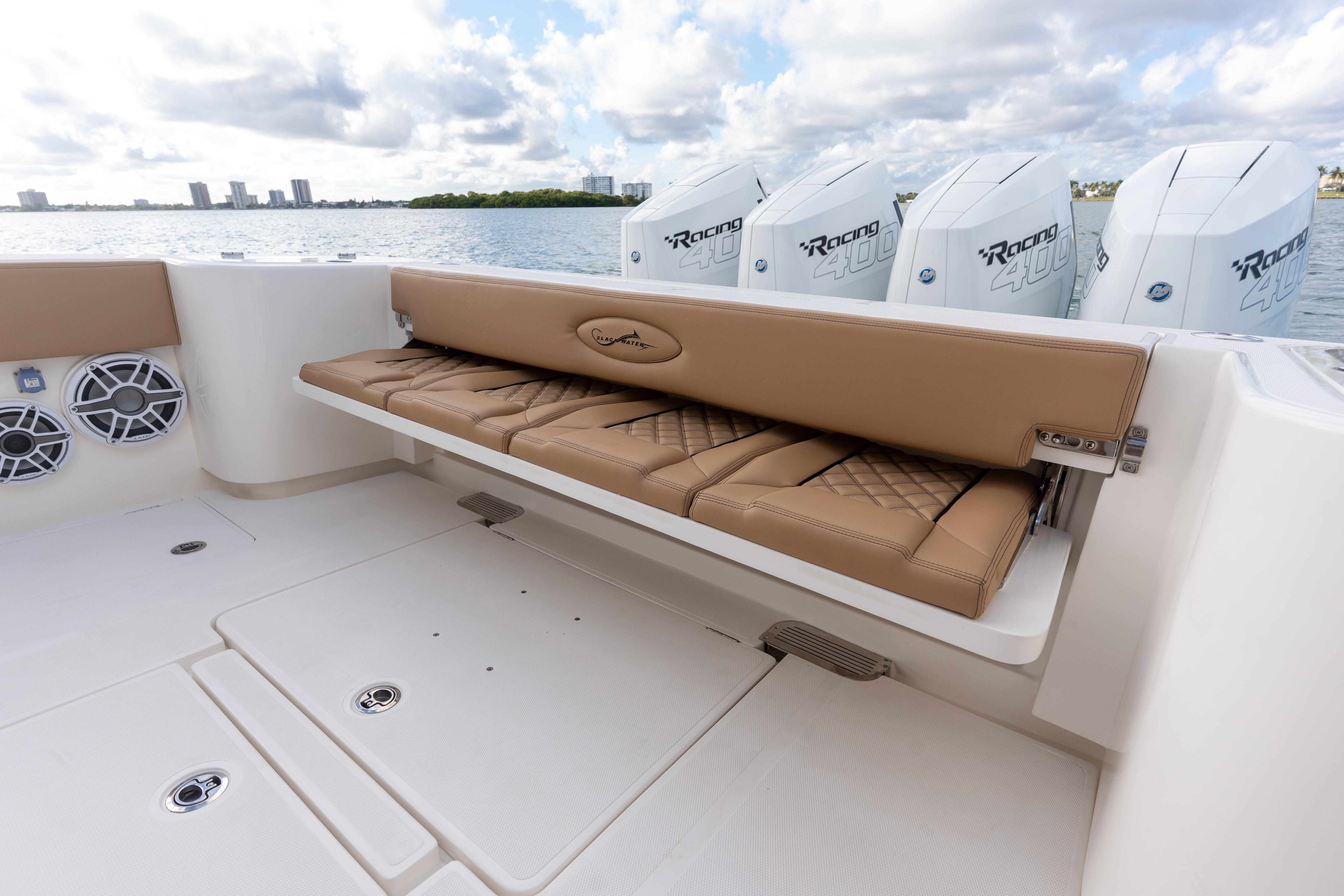 2026 Blackwater 41 Performance Fish boat with tan seating and powerful outboard engines.