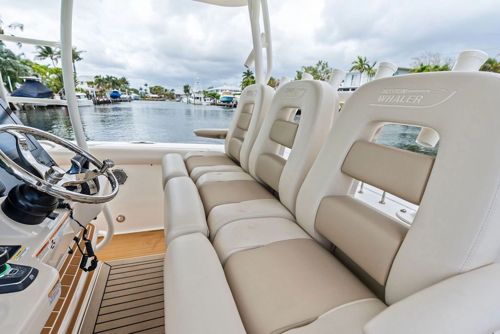 Interior of 2018 Boston Whaler 350 Outrage with beige seating.