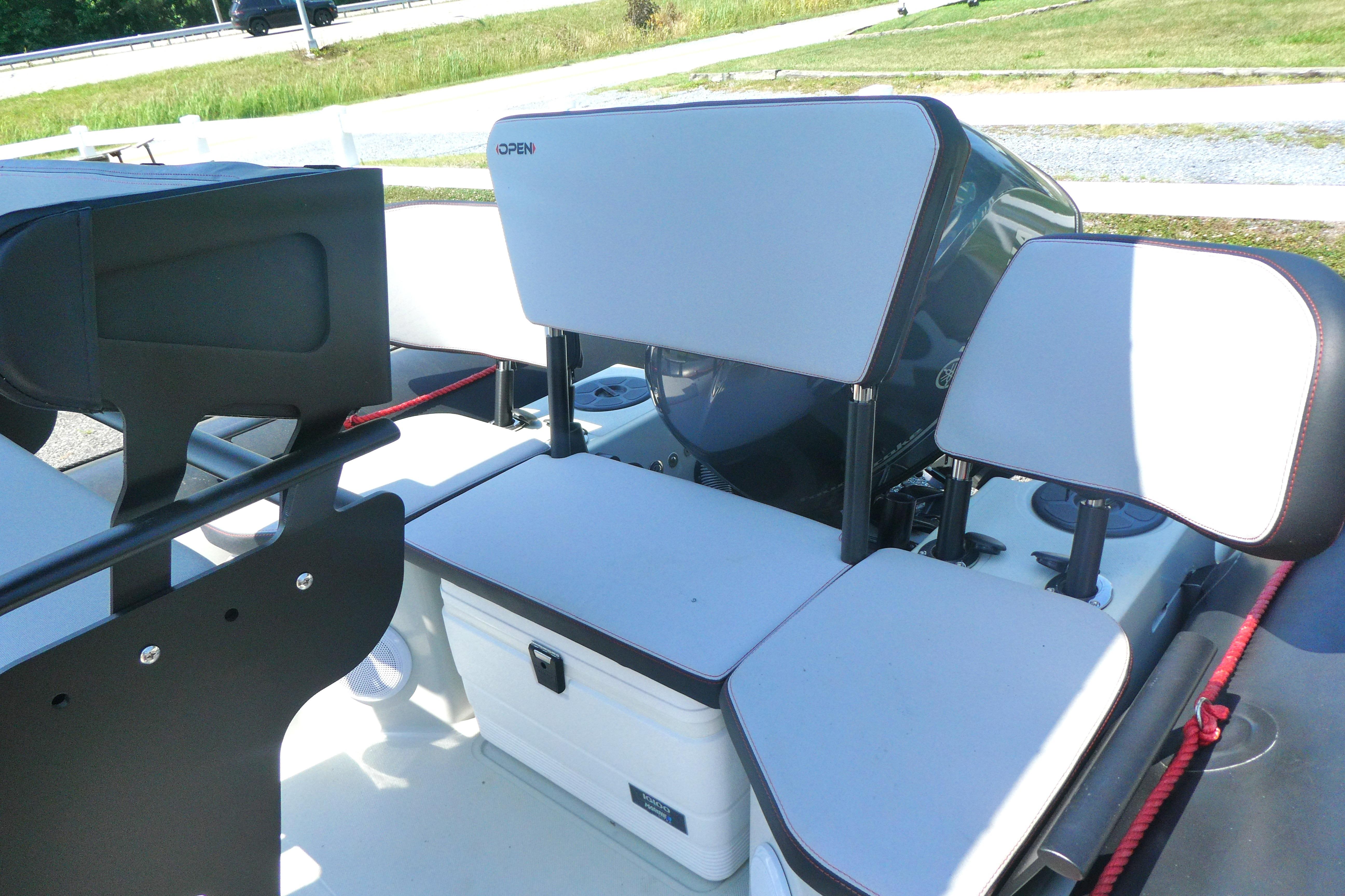 2022 Zodiac Pro 5.5 boat interior with cushioned seating and storage compartments.