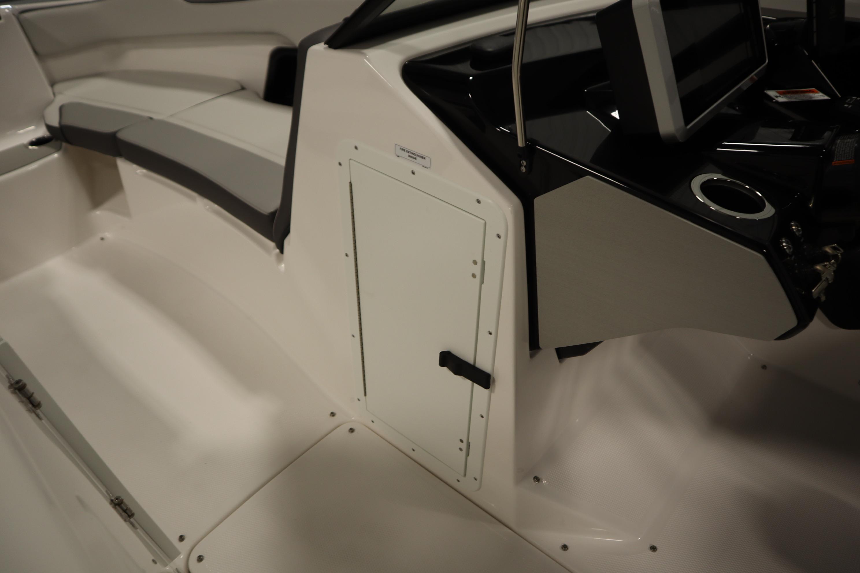 2026 Yamaha Boats AR250 interior with seating and control panel.