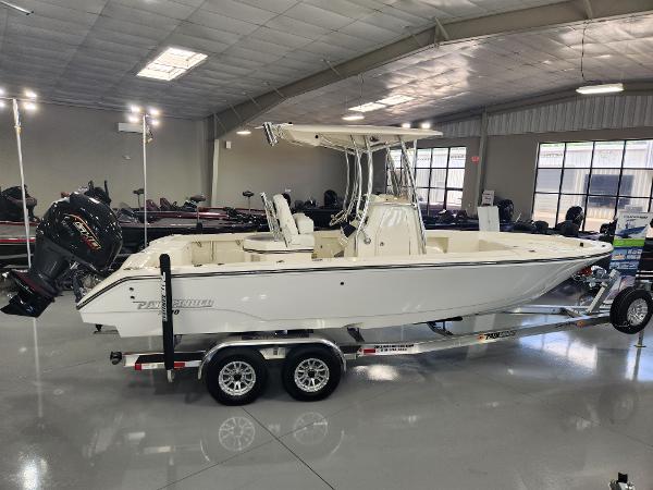 2025 Pathfinder 2400 Open boat on trailer in showroom.