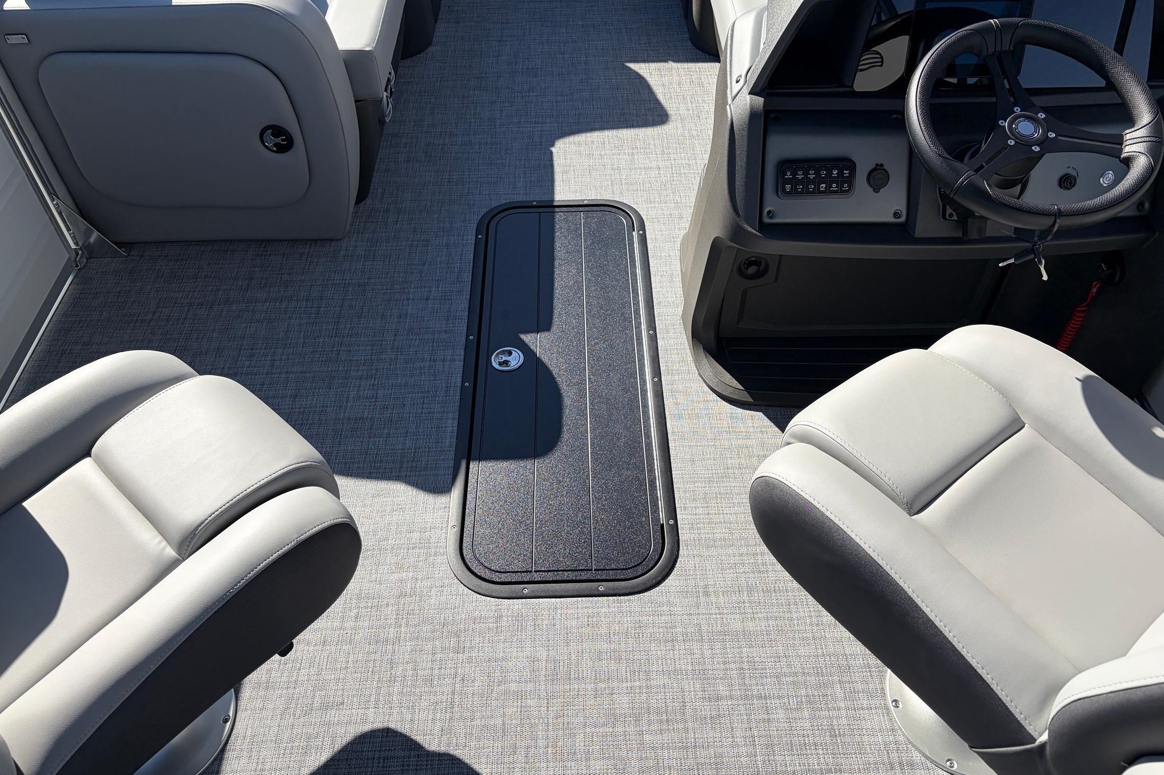 Interior of 2026 Sun Tracker Party Barge 22 RF XP3 with seating and steering console.