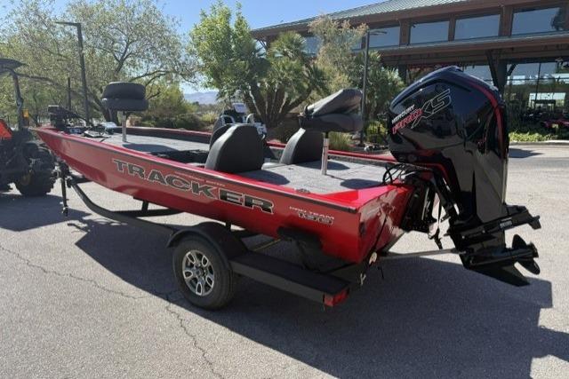 2026 Tracker Pro Team 190 boat on trailer, red exterior, parked outdoors.