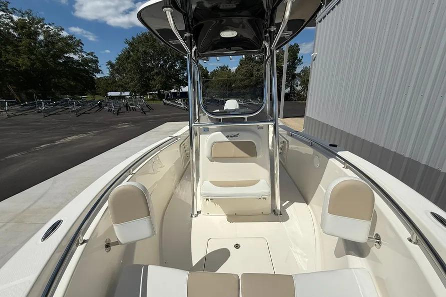 2026 Bulls Bay 230 Center Console boat with seating, docked outdoors.