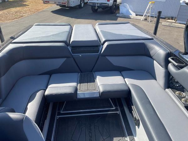 2025 Moomba Mondo boat interior with gray seating and sleek design.