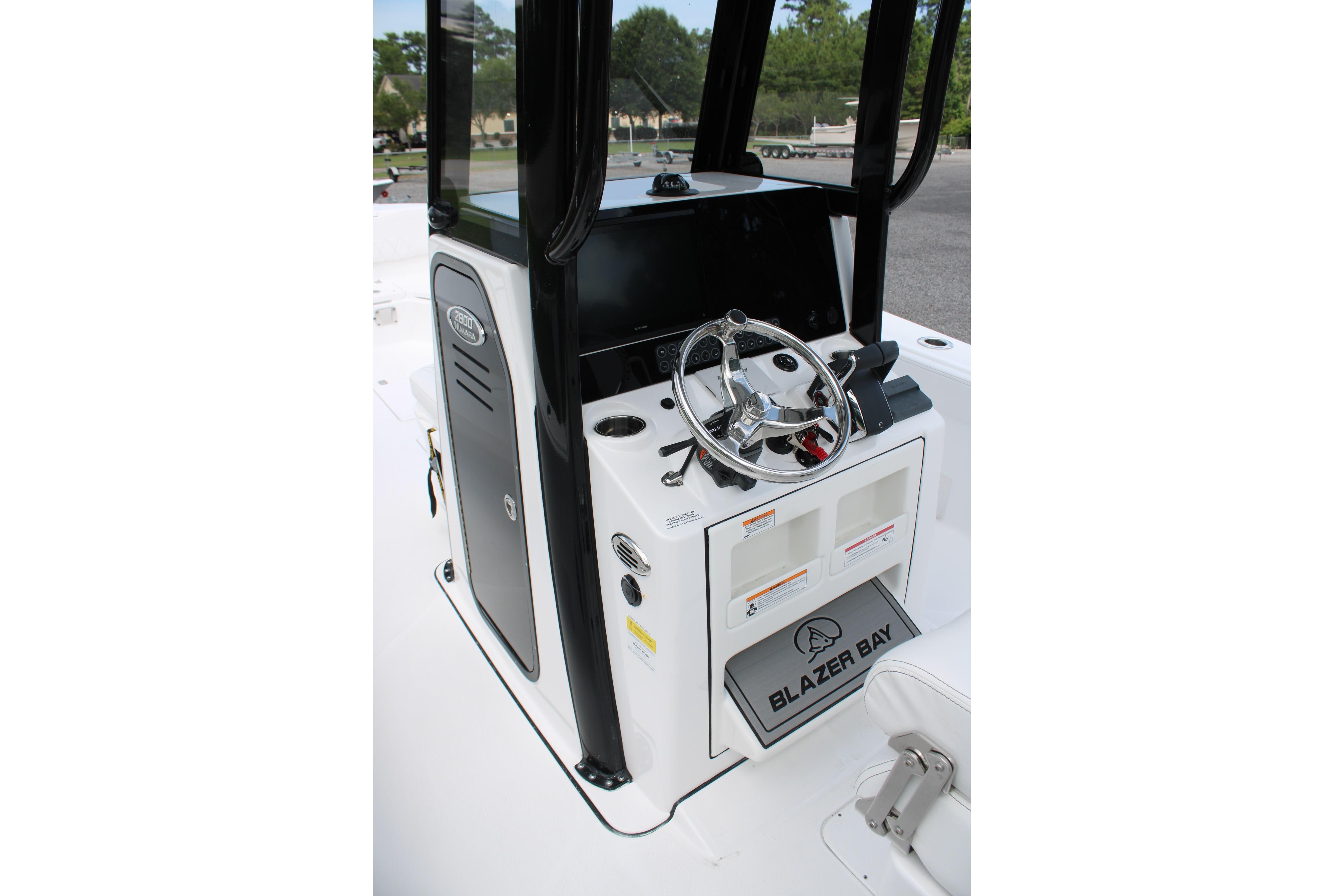 2027 Blazer Bay Makaira 2800 boat console with steering wheel and controls.