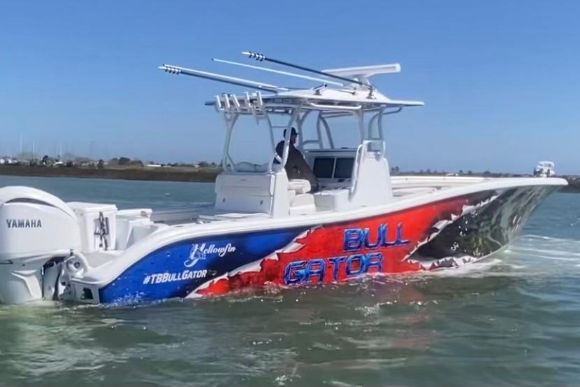 2024 Yellowfin 36 Offshore boat with vibrant "Bull Gator" graphics on the water.