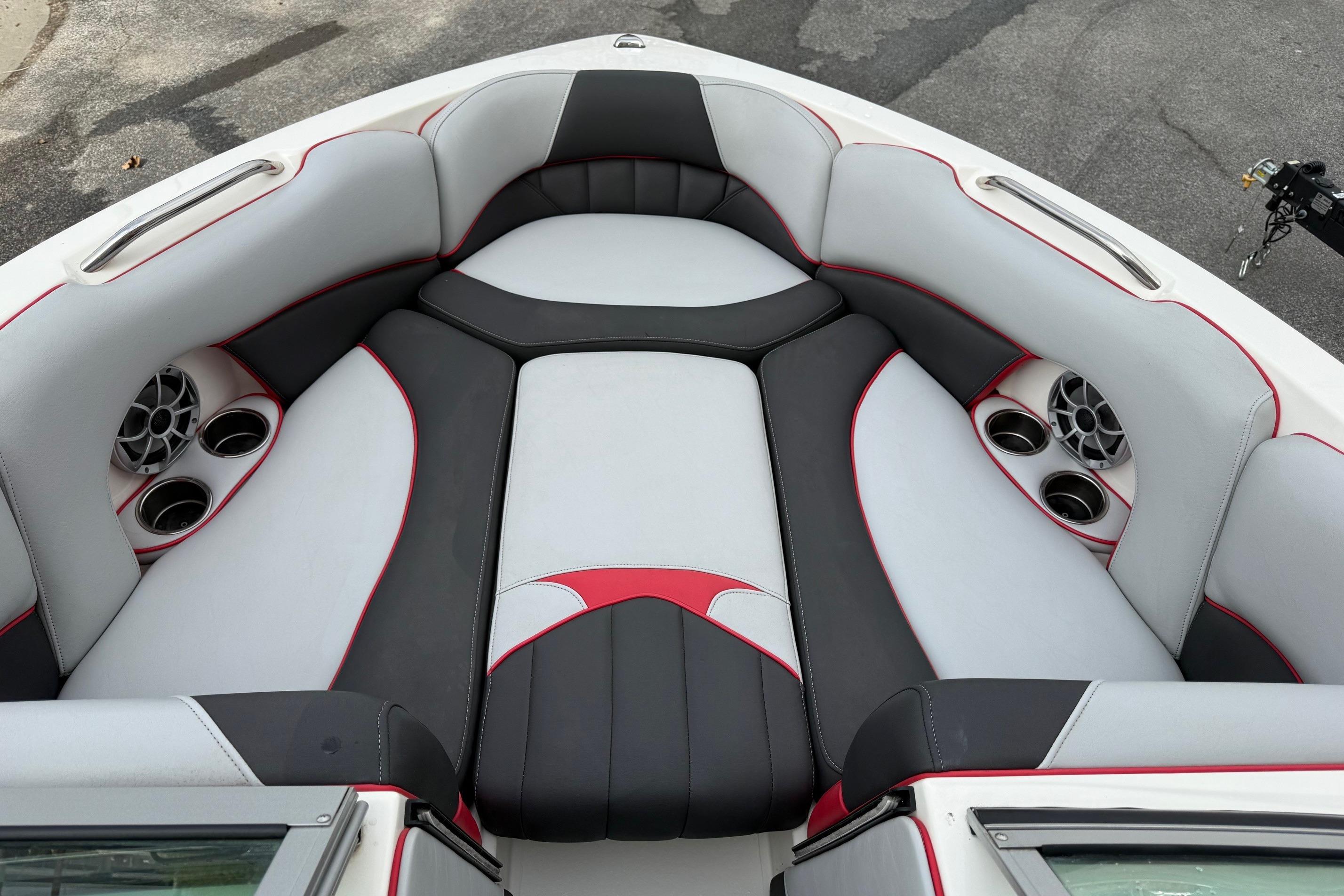 2014 MBSPORTS B523 23V boat interior with stylish seating and cup holders.