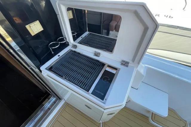 Outdoor grill on 2016 Sea Ray Sundancer 510 yacht deck, featuring sleek design and functionality.
