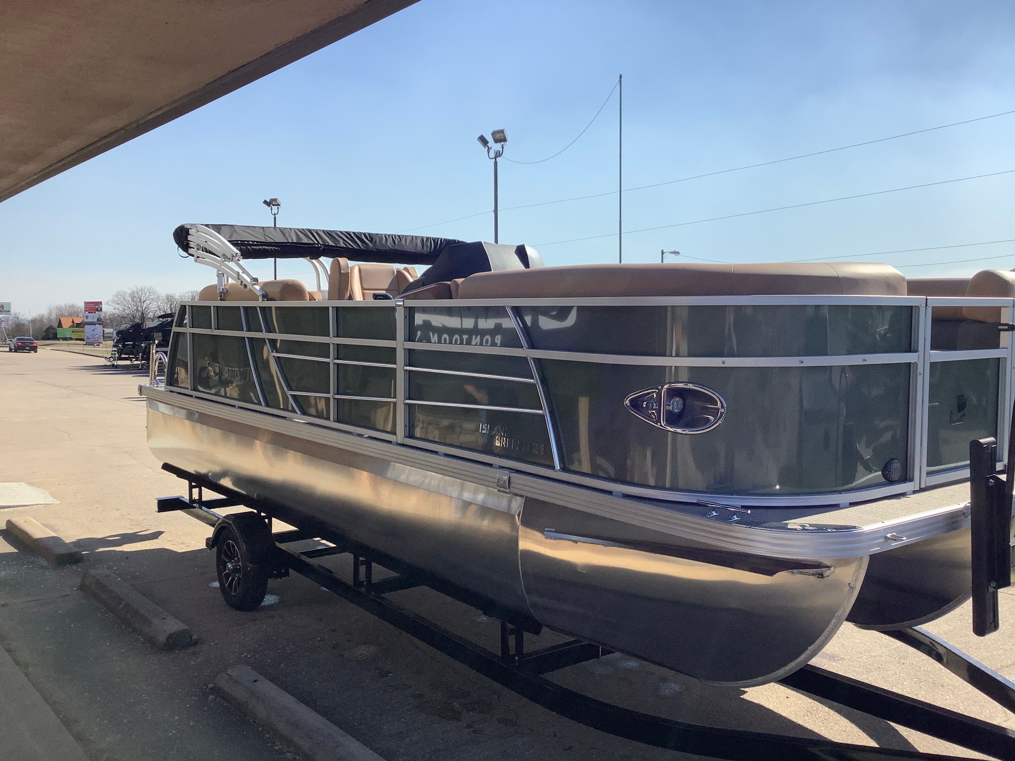 2026 Landau 21 Island Breeze pontoon boat on trailer.