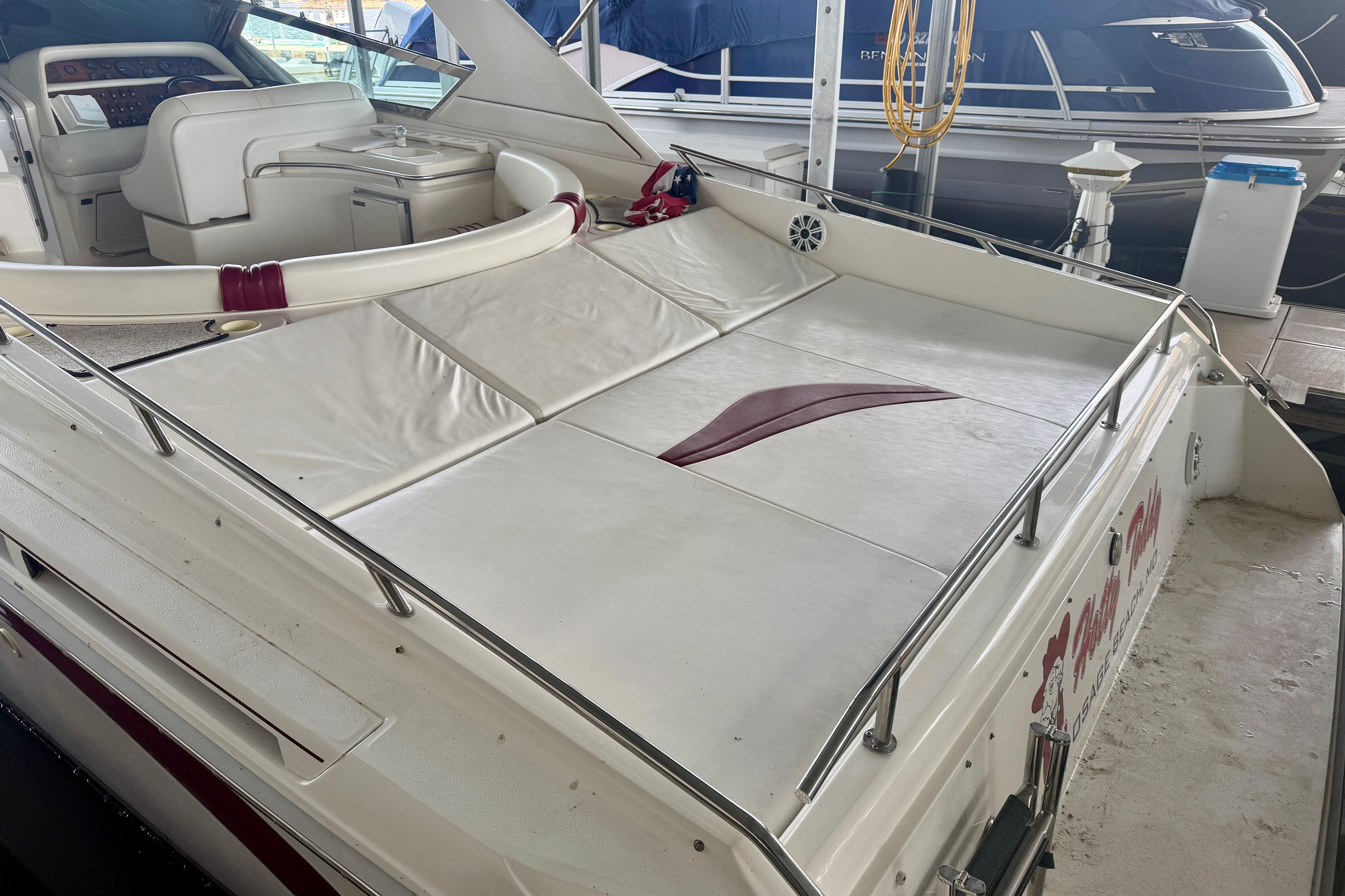 1995 Sea Ray 380 Sun Sport boat with spacious deck and seating area.