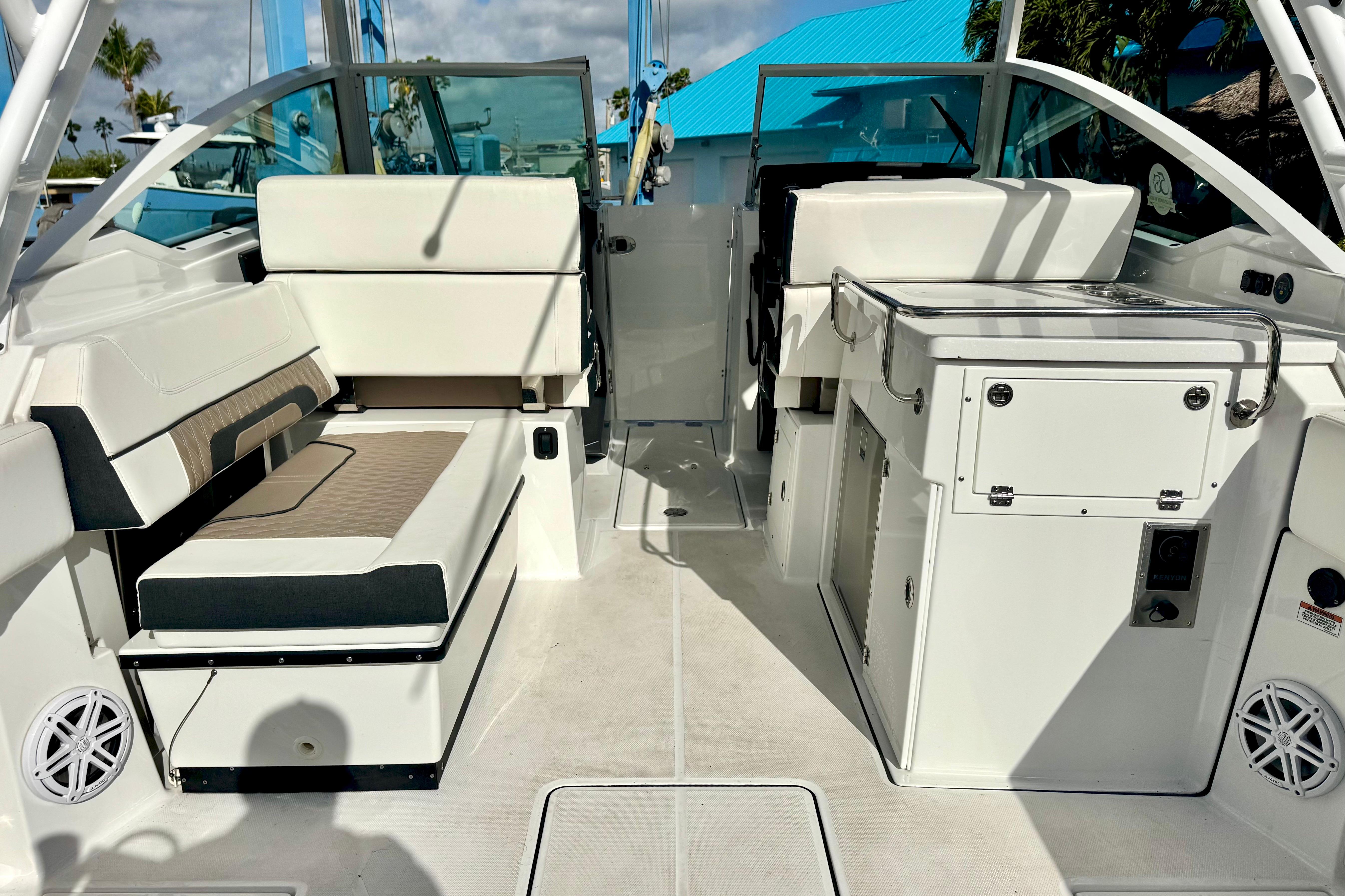 2023 Blackfin 272 DC boat interior with seating and storage compartments.