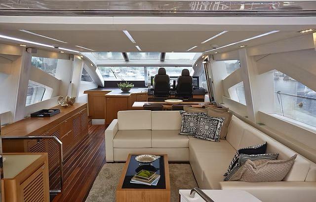 Luxurious interior of 2026 Schaefer 25M yacht with modern seating and elegant decor.