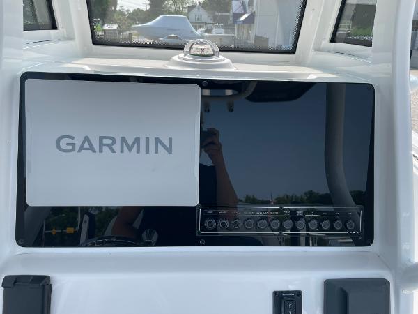 2025 Tidewater 232 CC Adventure boat dashboard with Garmin navigation system.