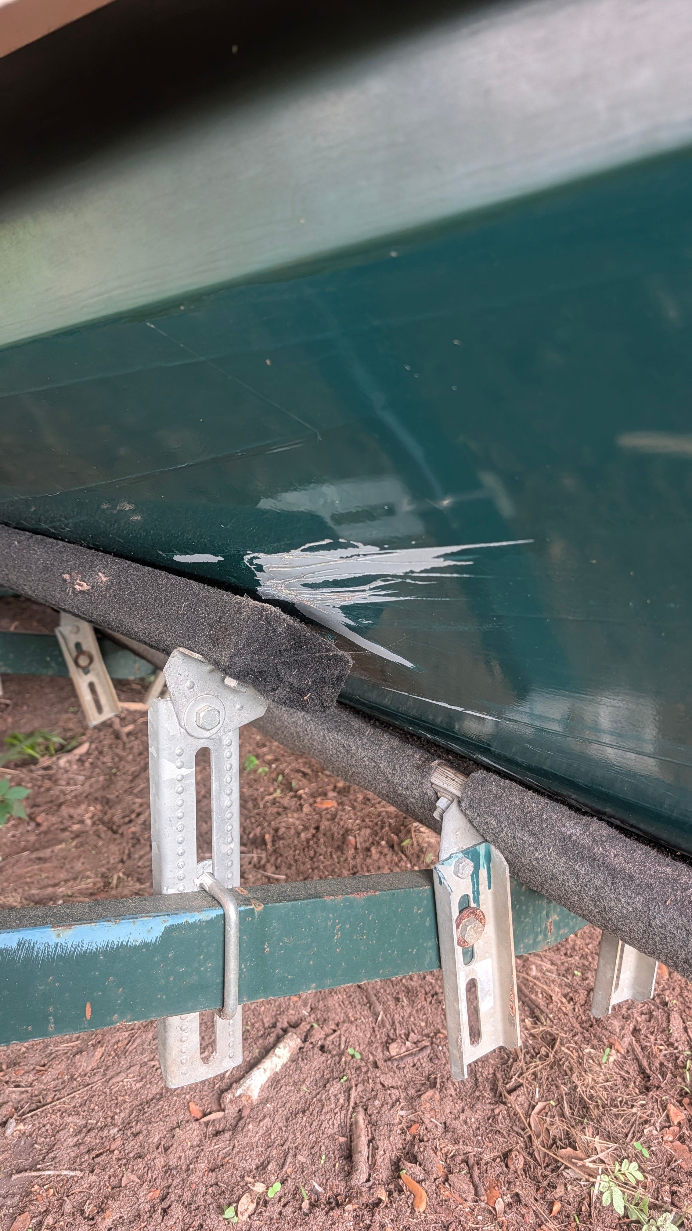 Scratch on hull of 1930 Chris-Craft Triple Cockpit boat.