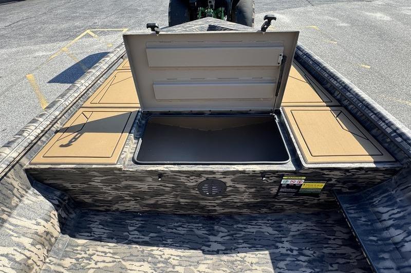2026 Havoc 1656 MRST MACH 1 boat with open storage compartment, camo design.