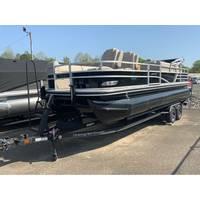 2025 Ranger Reata 223FC pontoon boat on trailer, parked outdoors.
