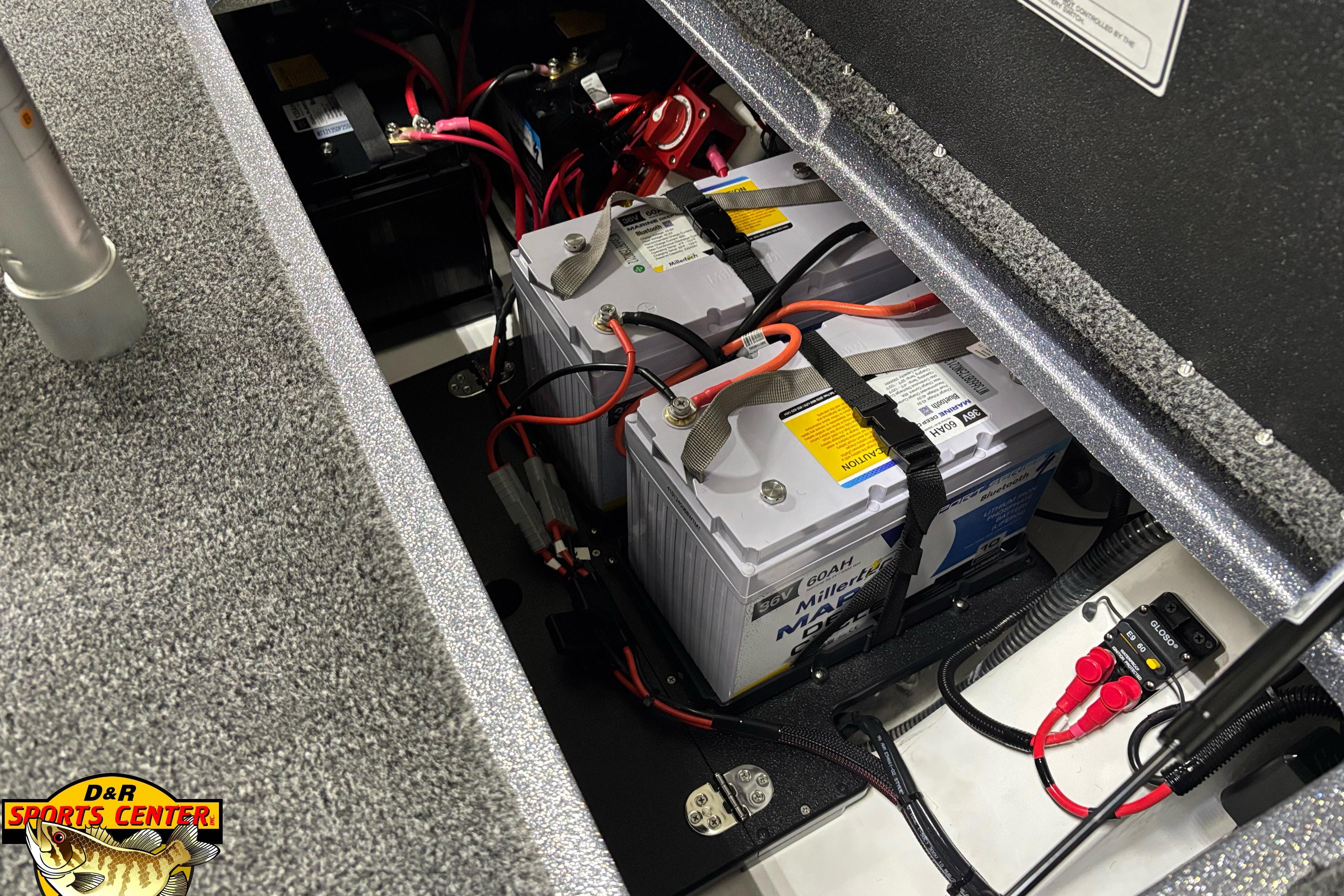 Battery compartment of 2026 Nitro Z20 XL boat with wiring and connections.