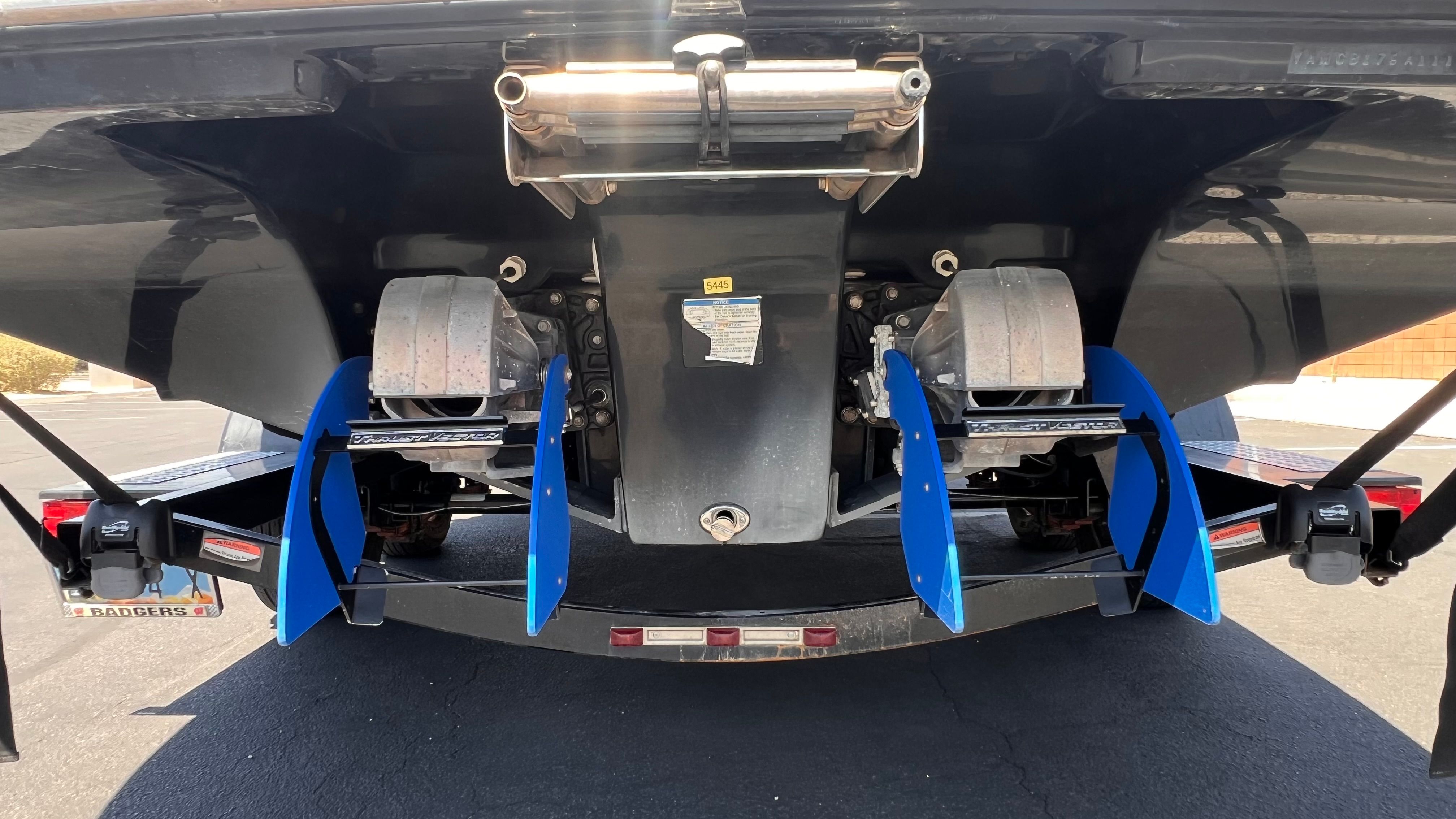 Rear view of a 2011 Yamaha AR240 HO boat on a trailer.
