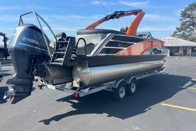 2024 Bennington 23 RXFBA pontoon boat on trailer with Yamaha outboard motor.