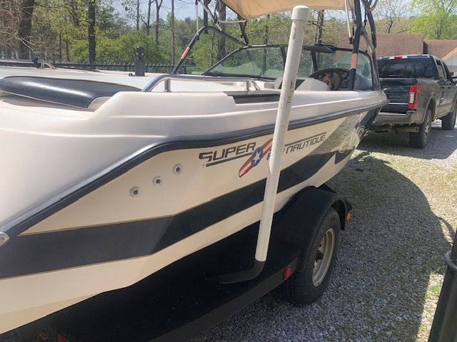2001 Correct Craft Super Air Nautique on trailer, side view.