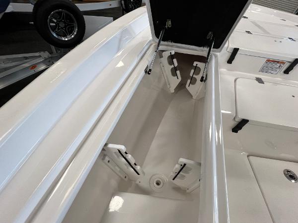 2024 Sea Fox 231 Bay boat storage compartment with open hatch.