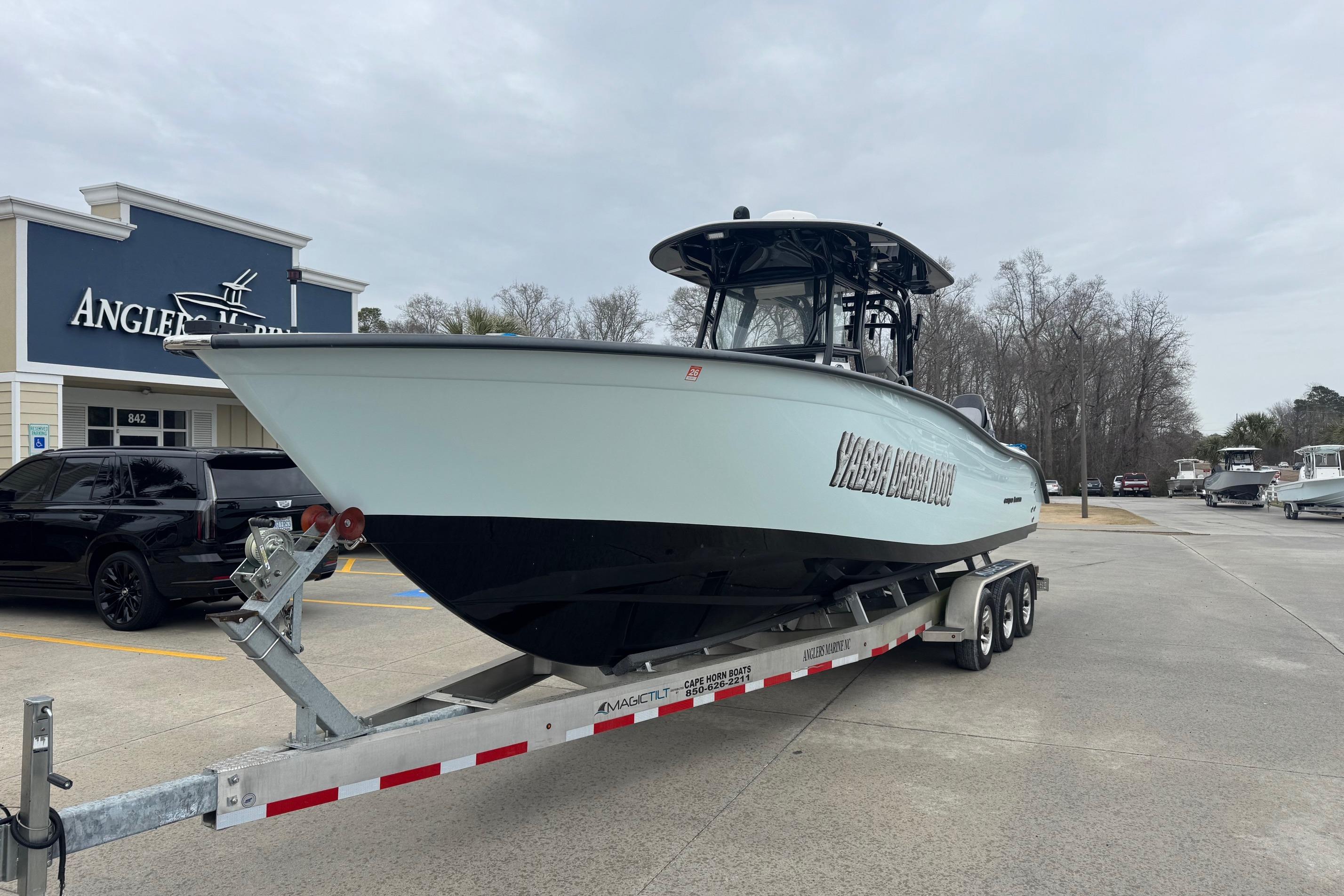 2024 Cape Horn 32 XS boat on trailer at Angler's Marine dealership.