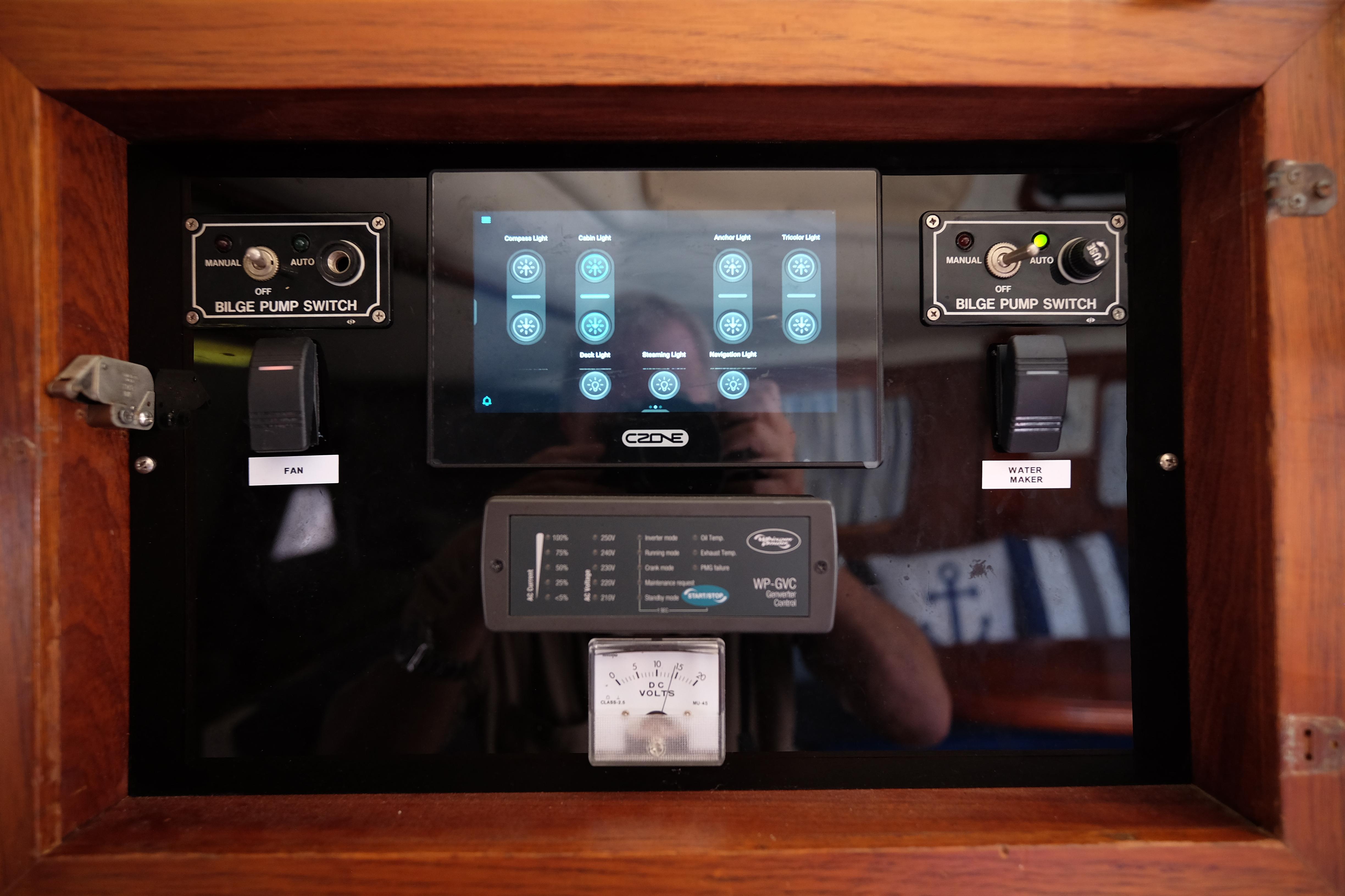 Control panel of a 1996 Simpson Inspiration boat with bilge pump switches and digital display.