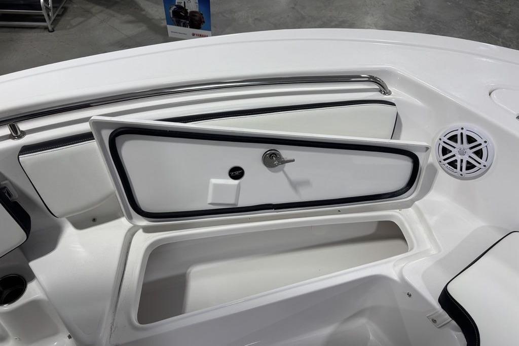 2026 Tidewater 198 CC Adventure boat interior storage compartment with speaker detail.