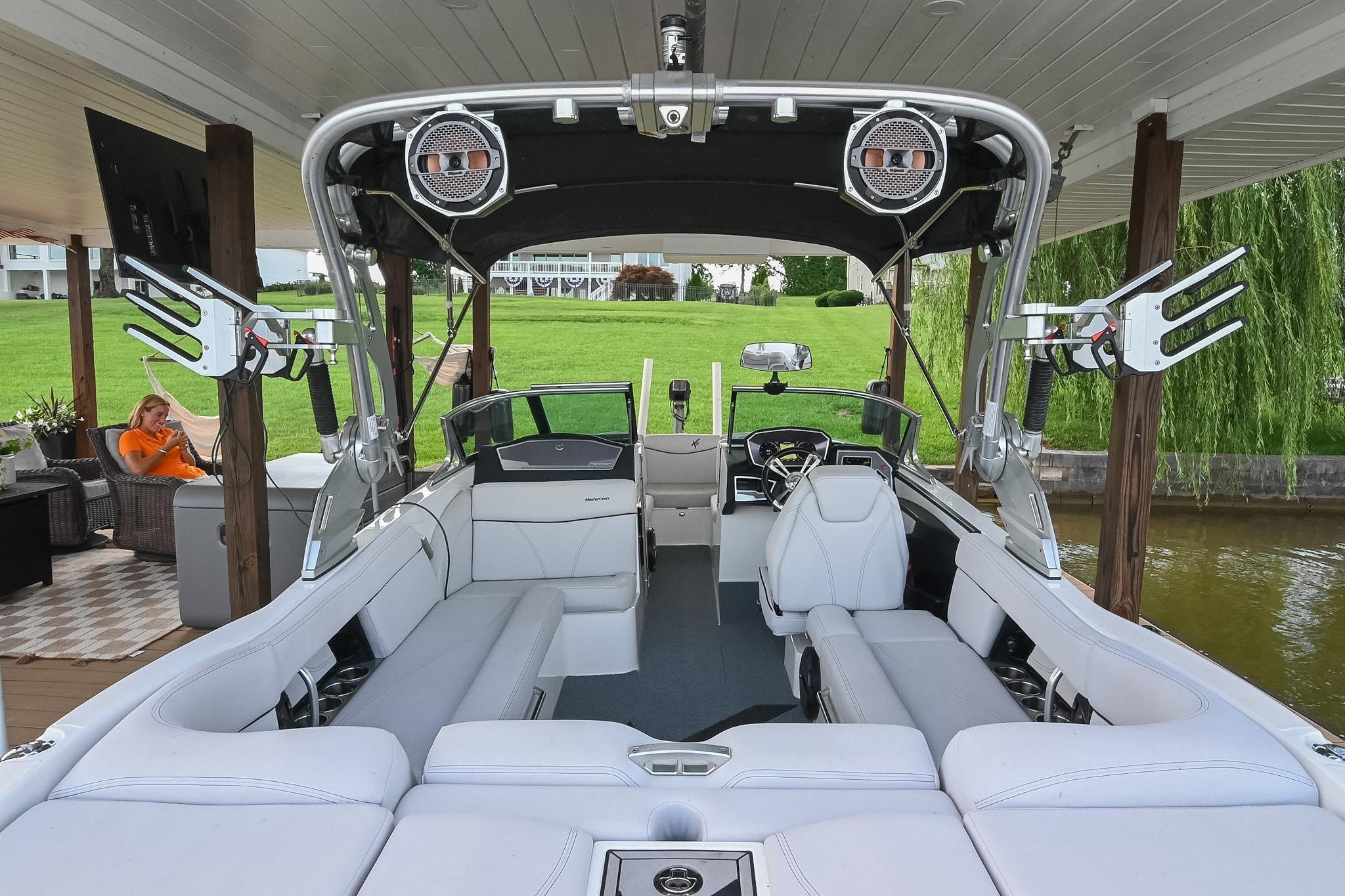 2018 MasterCraft X23 boat interior with sleek seating and advanced audio system.
