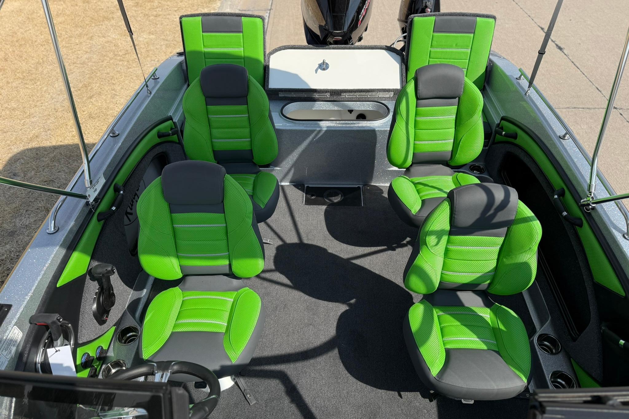 2026 Ranger 1880MS boat interior with vibrant green seating and modern design.