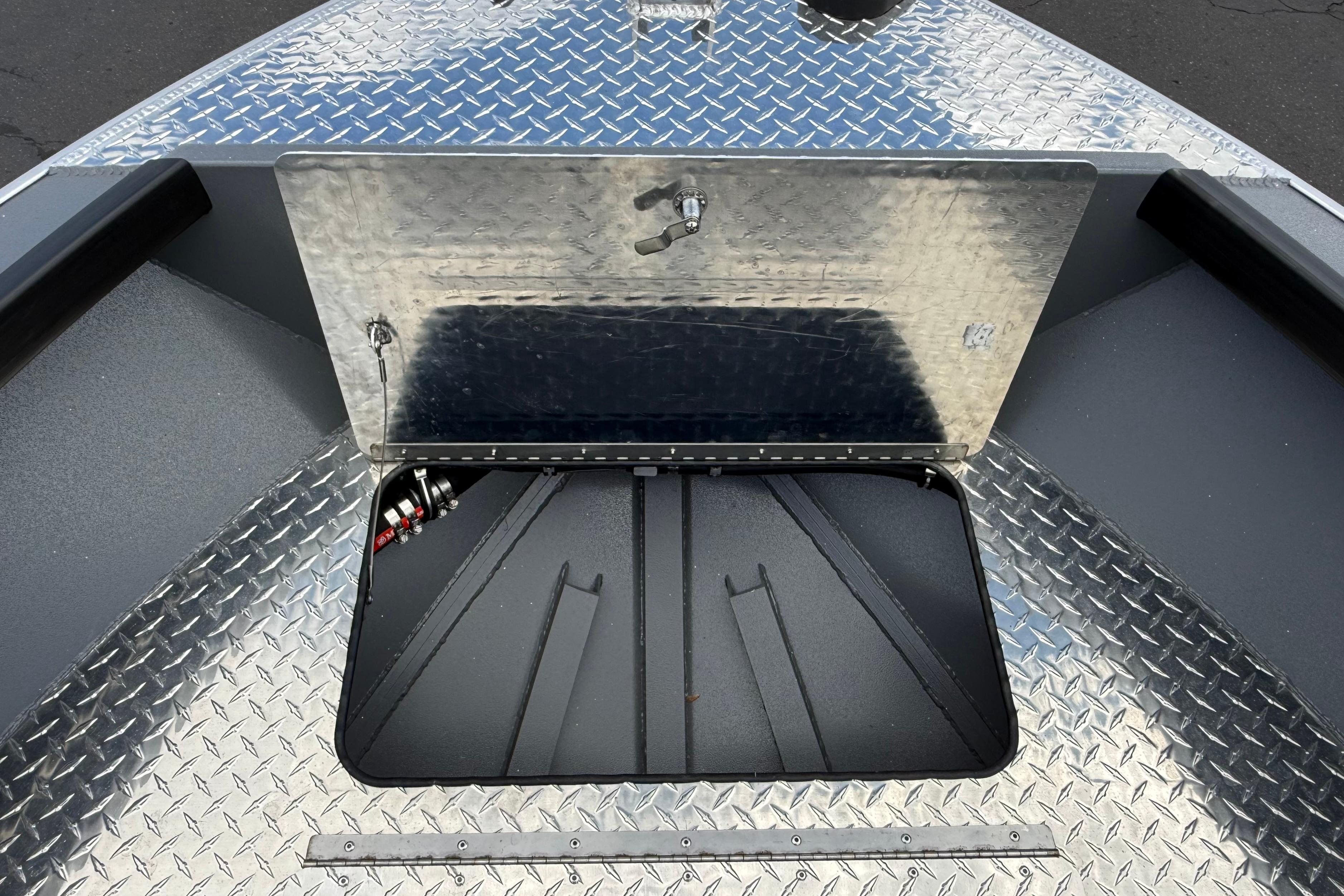 Alumaweld Free Drifter 20 (2026) boat storage compartment with diamond plate finish.