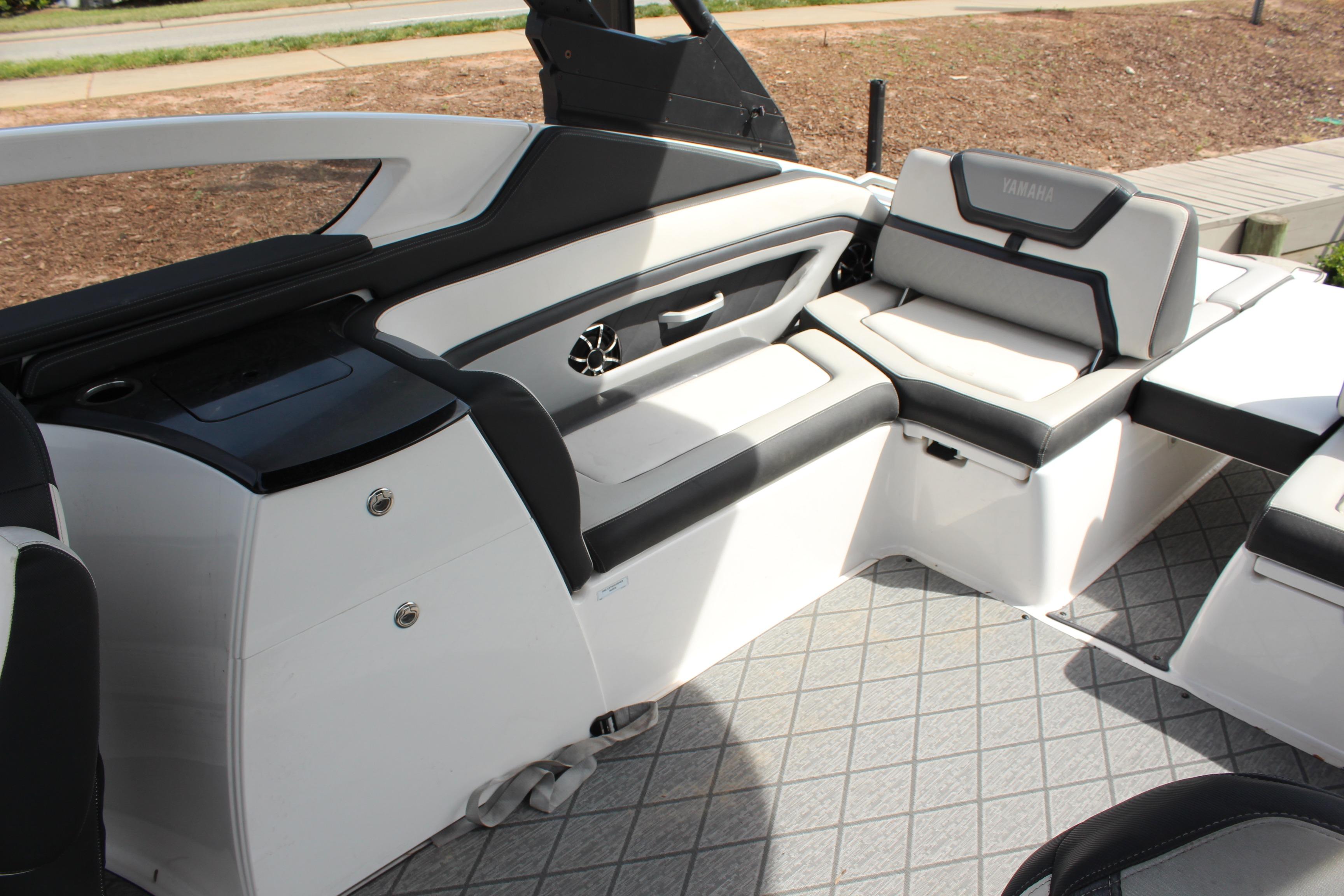 Interior of 2020 Yamaha Boats 275SE, featuring sleek seating and modern design elements.