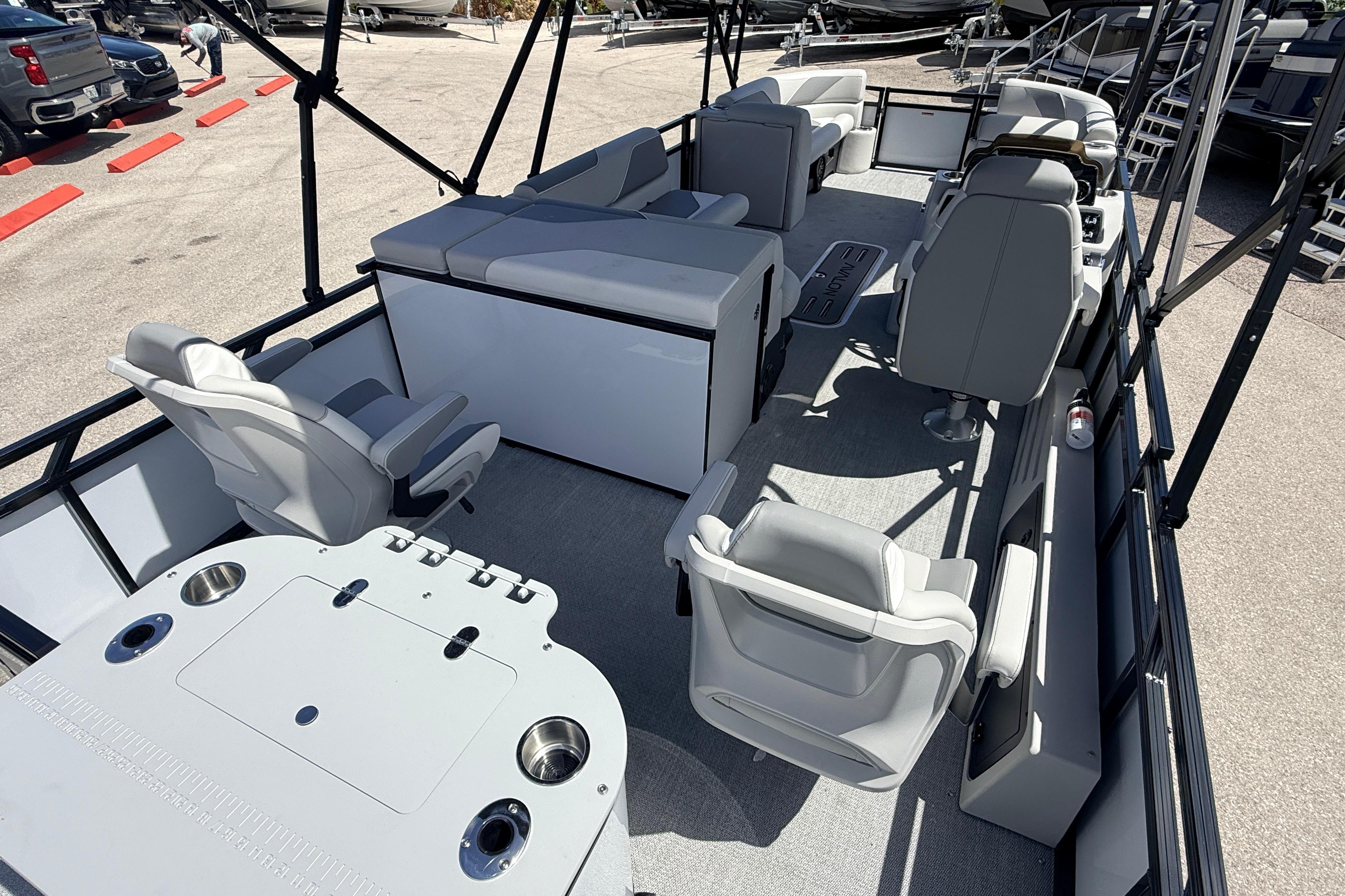 2026 Avalon 2385 Venture 85 Tri Toon boat interior with seating and fishing setup.