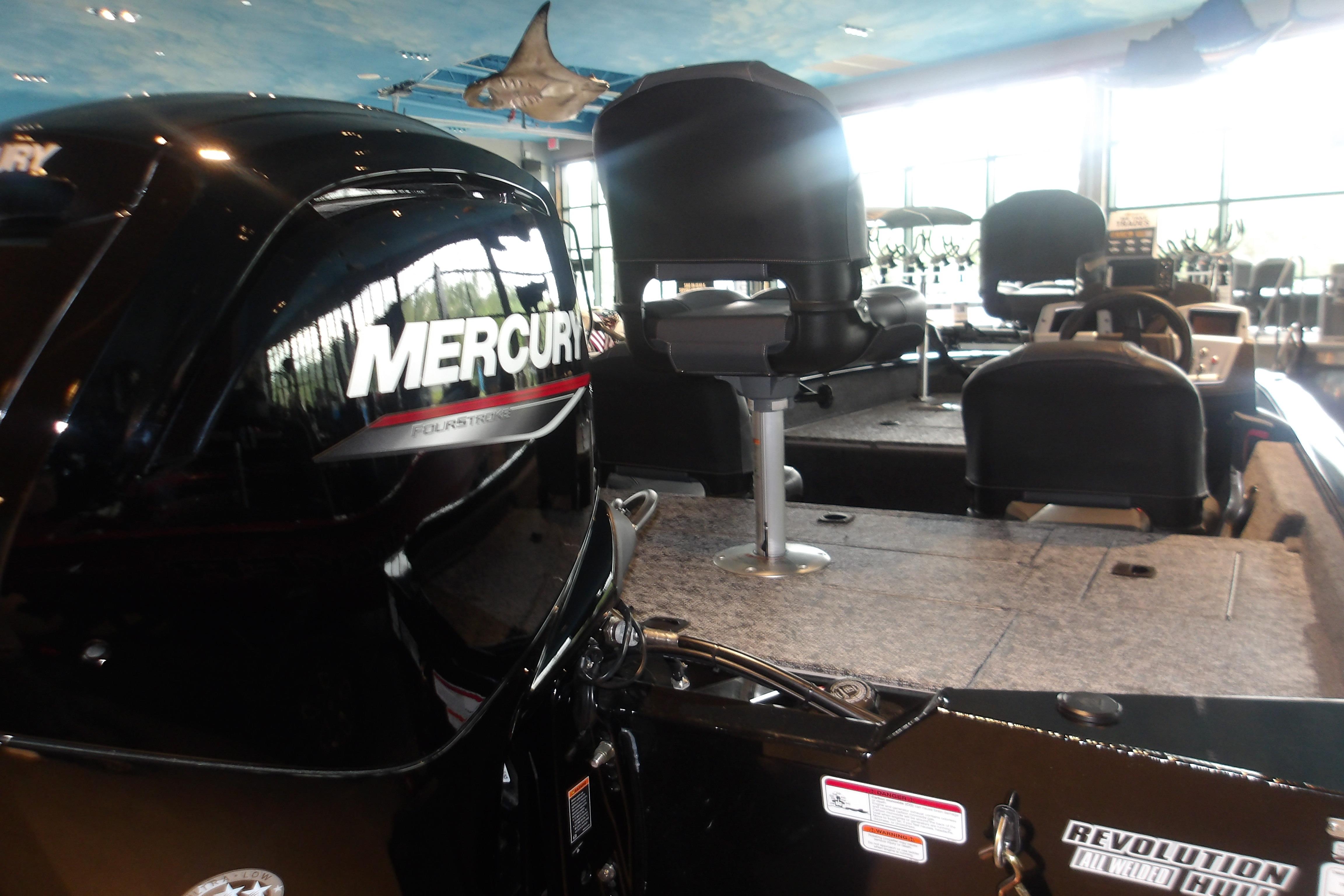 2026 Tracker Pro Team 175 Crappie Edition boat with Mercury engine in showroom.