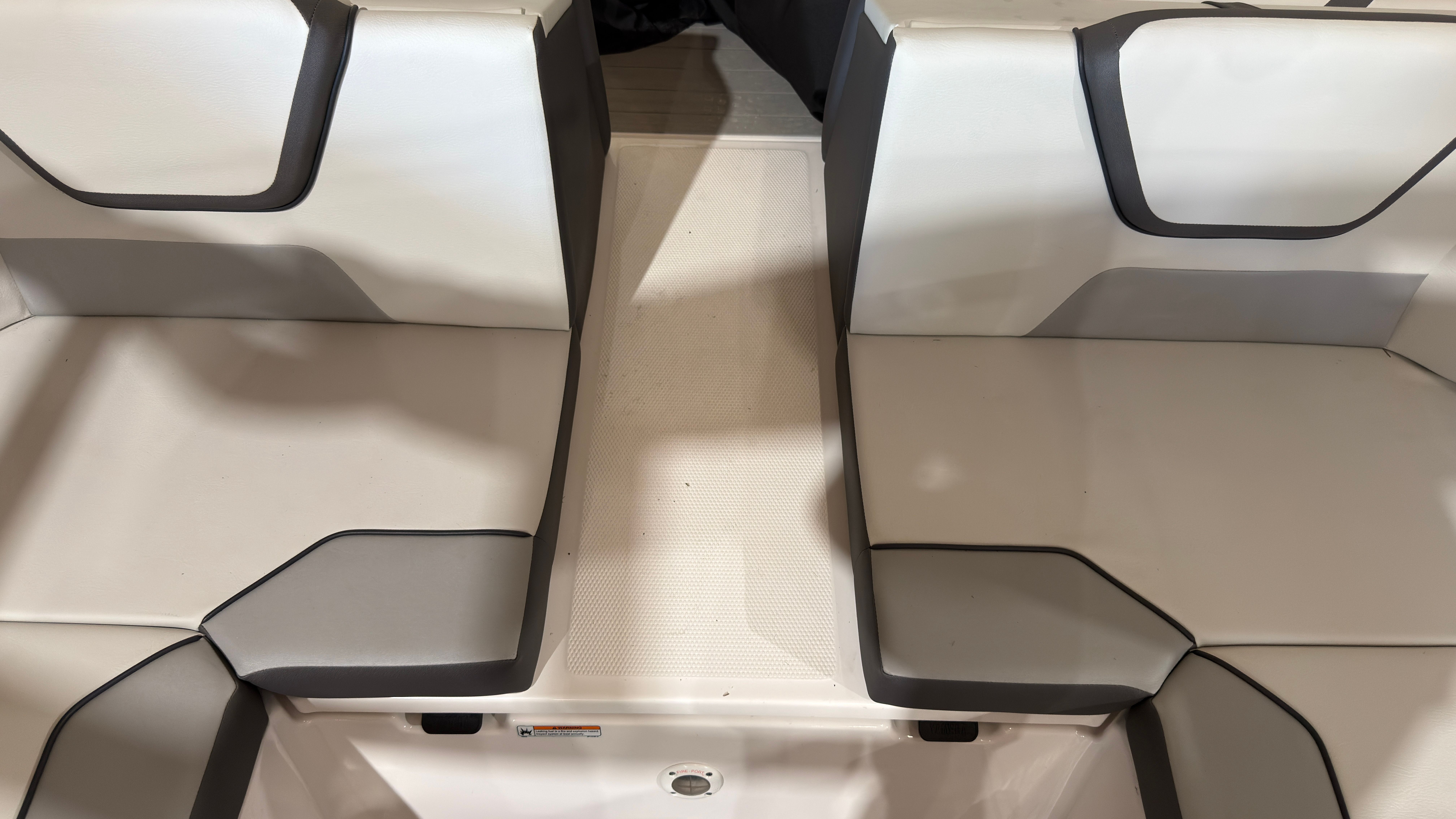 Interior of 2024 Yamaha Boats AR220 with gray seating.